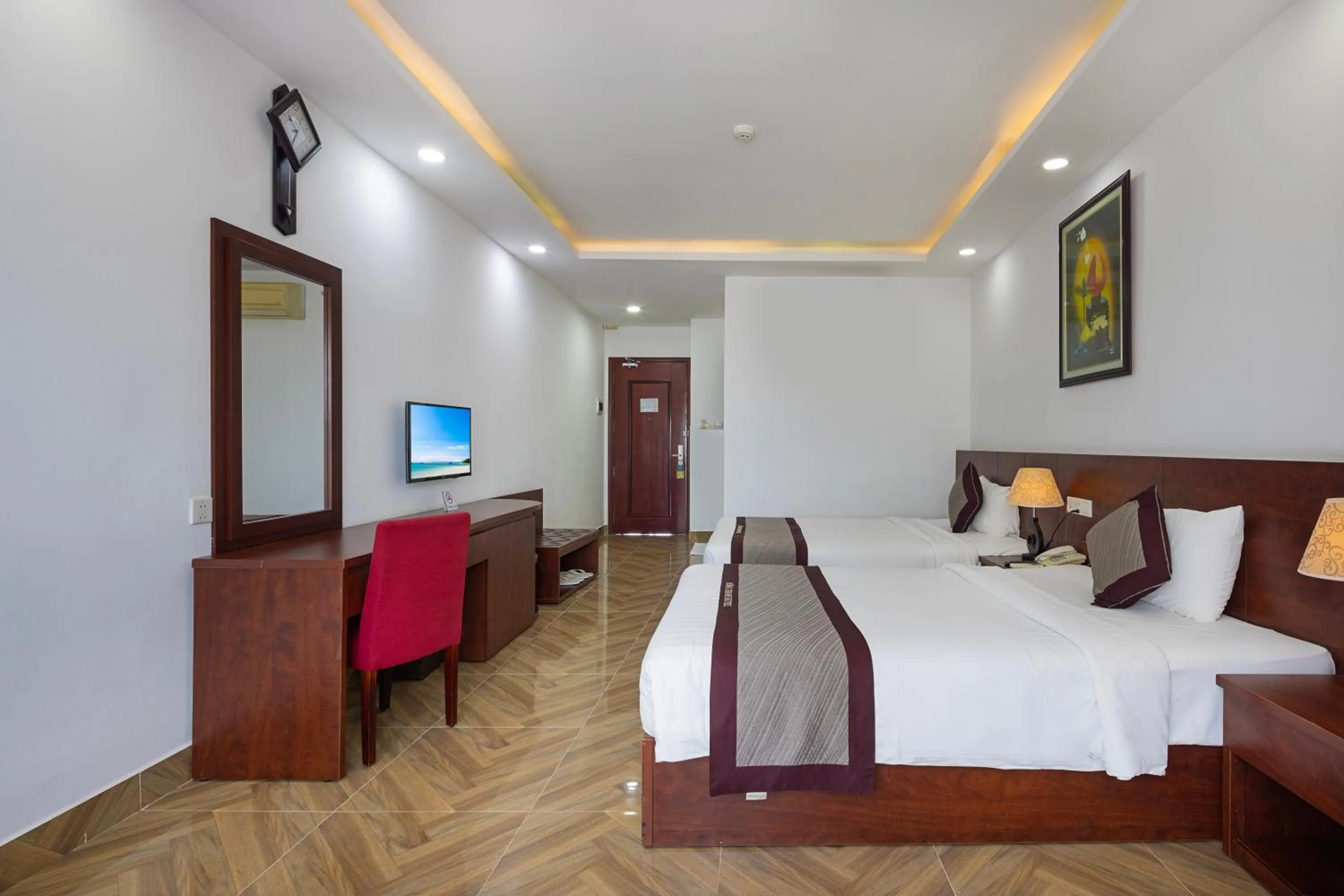 TV and multimedia, Bed in Gem Nha Trang Hotel