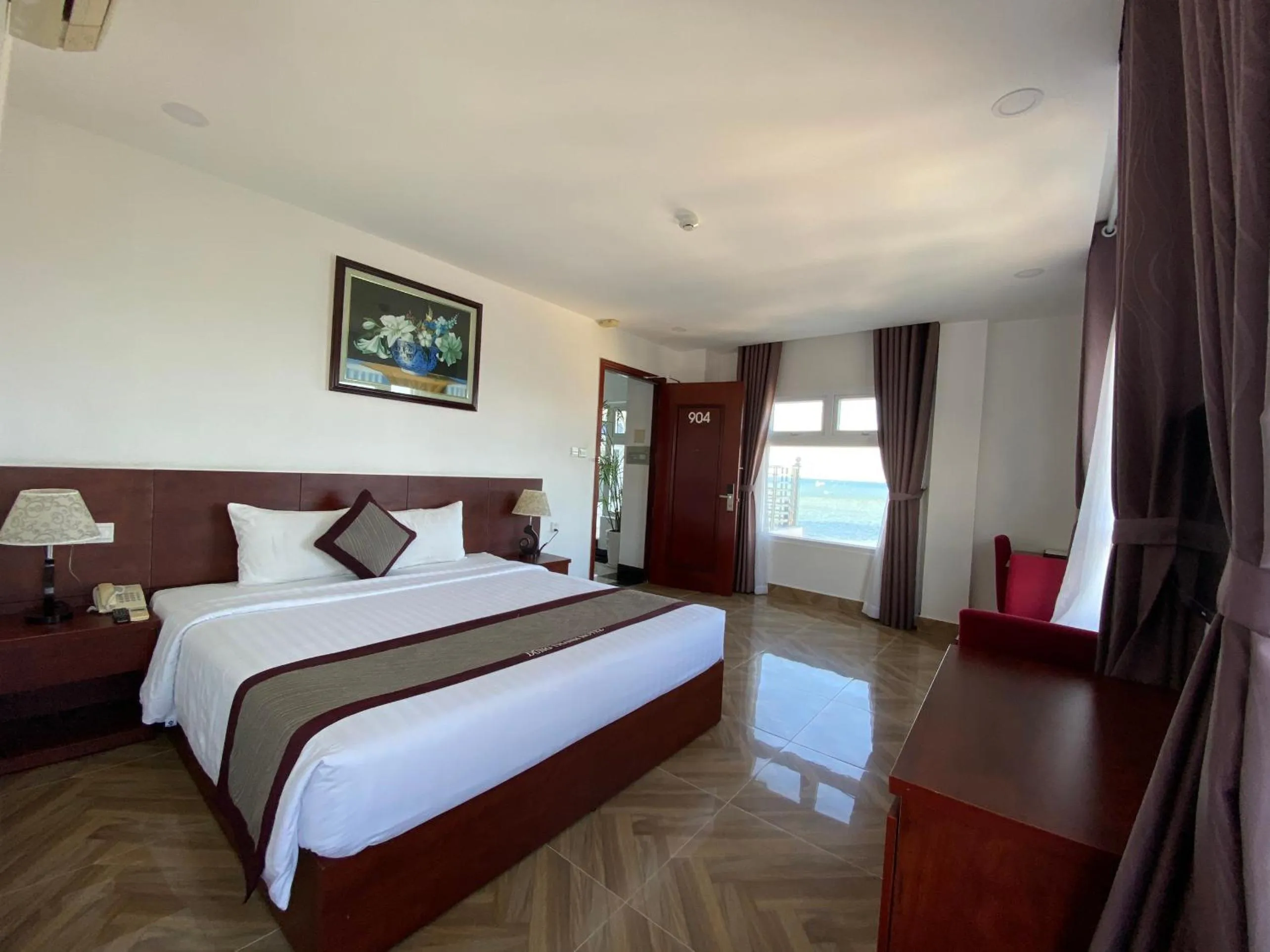 Photo of the whole room, Bed in Gem Nha Trang Hotel