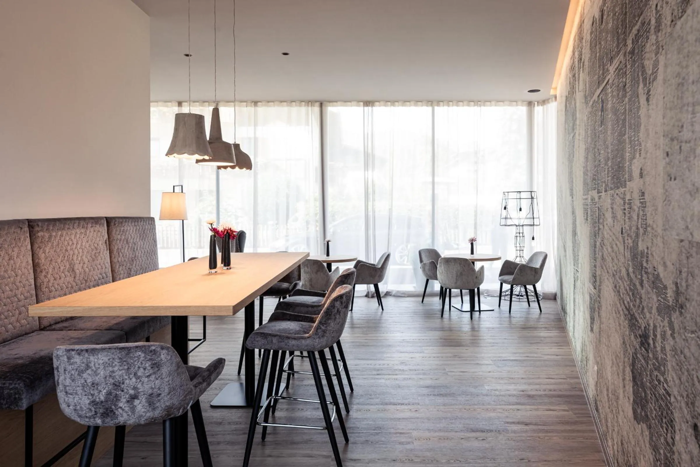 Communal lounge/ TV room in B&B Boutiquehotel Clara