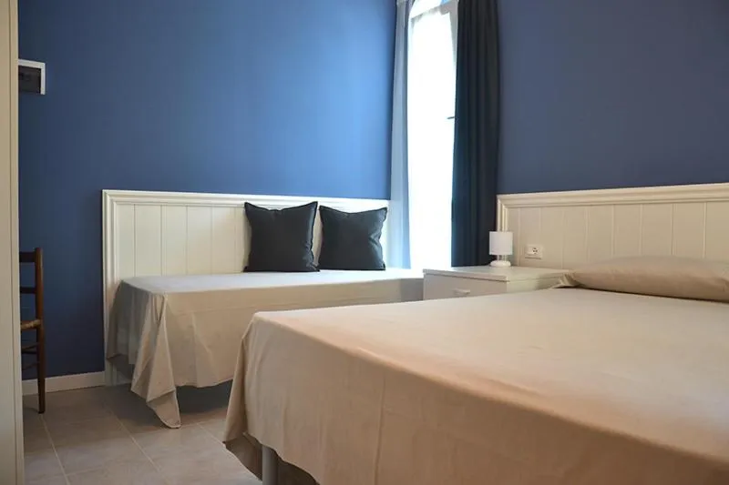 Bed in Hotel Maximilian