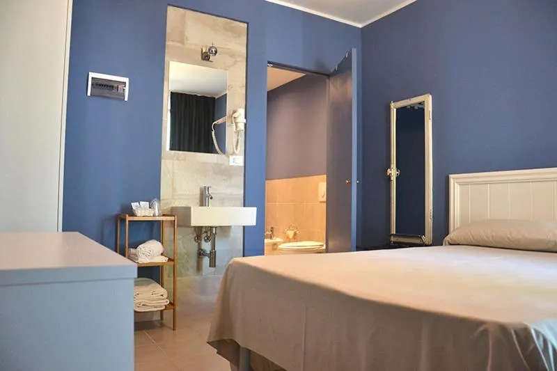 Bed in Hotel Maximilian