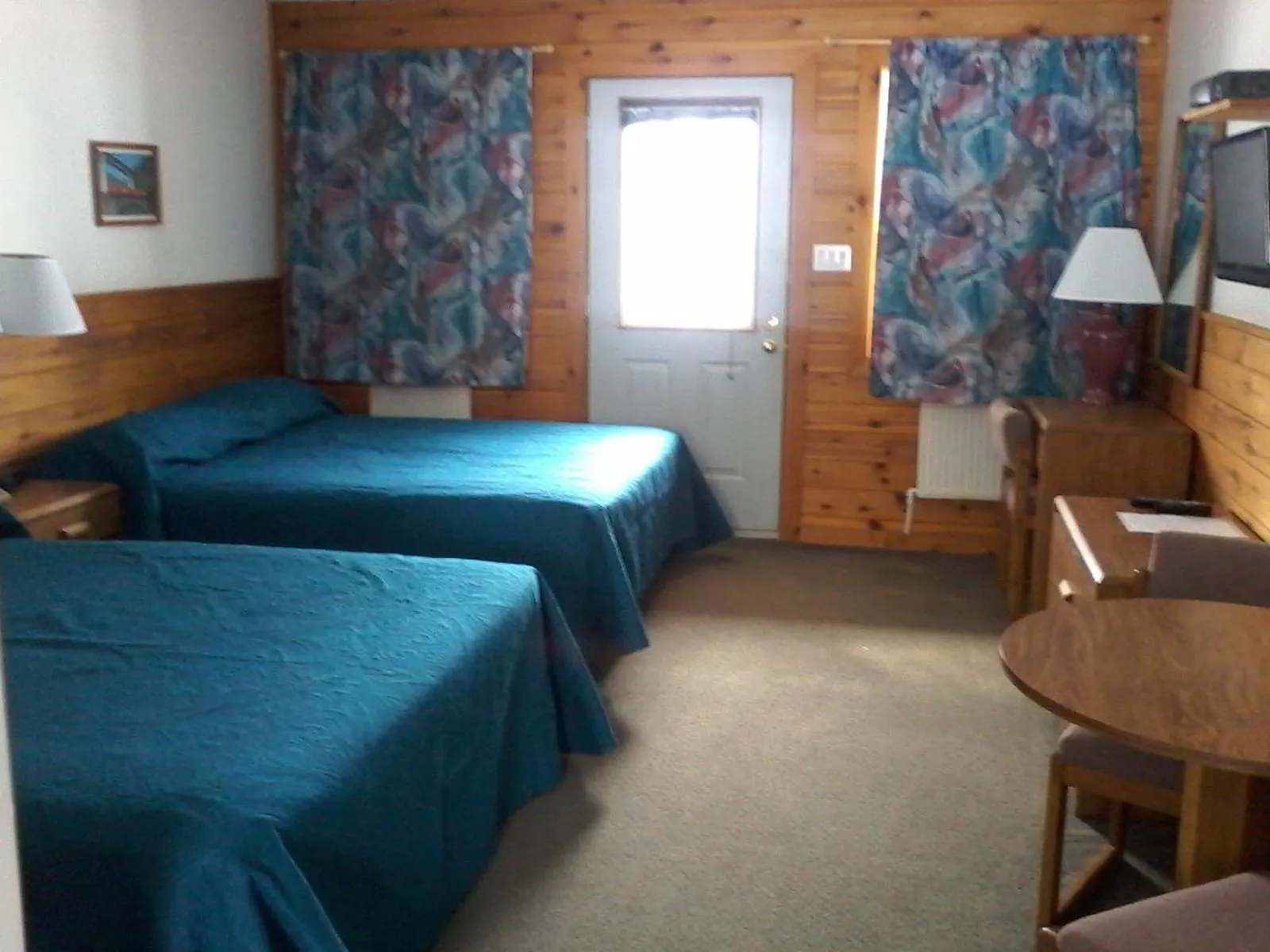 Bed in Quiet Bay Inn & Café