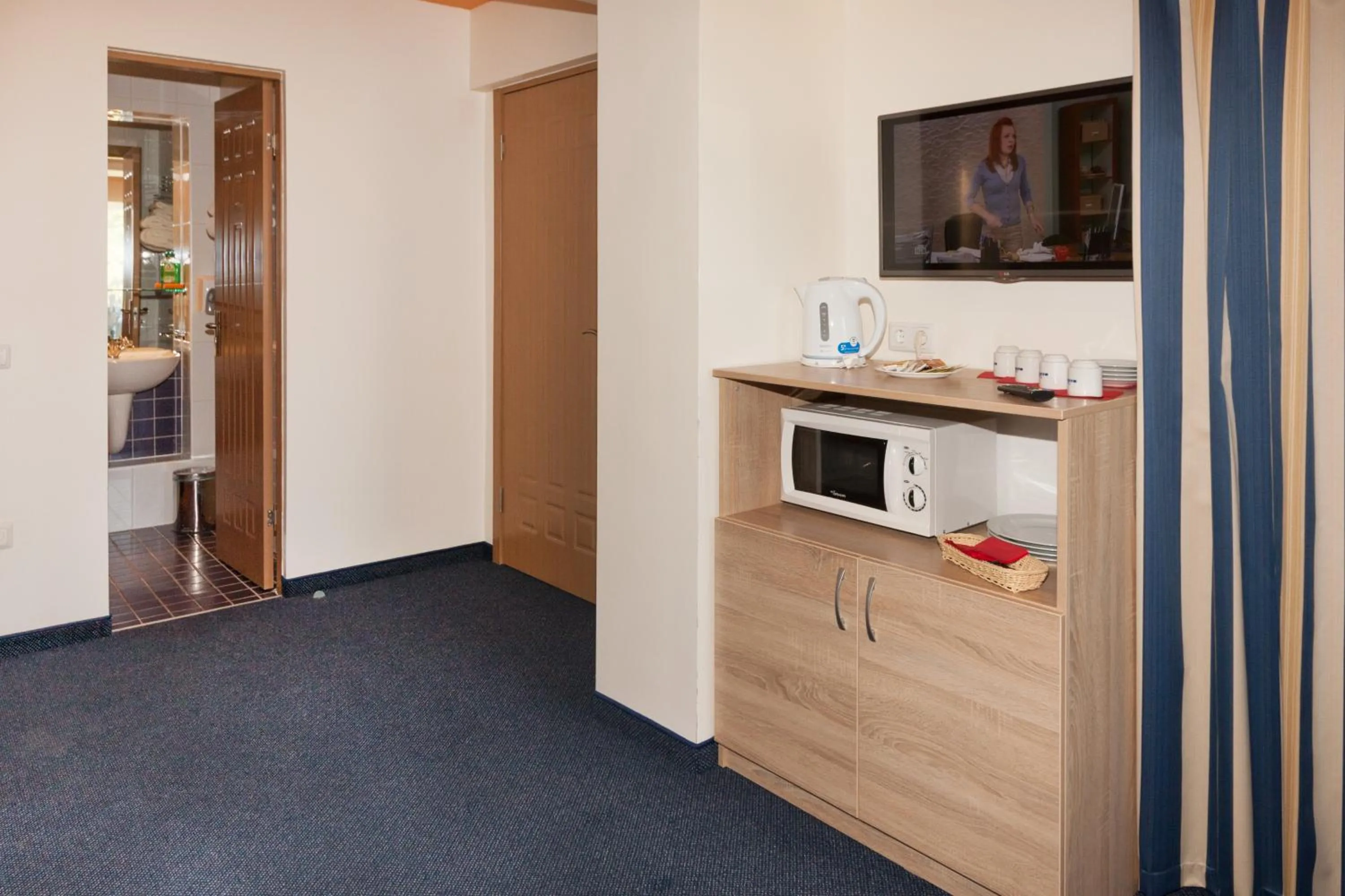 TV and multimedia in Tauras Center Hotel