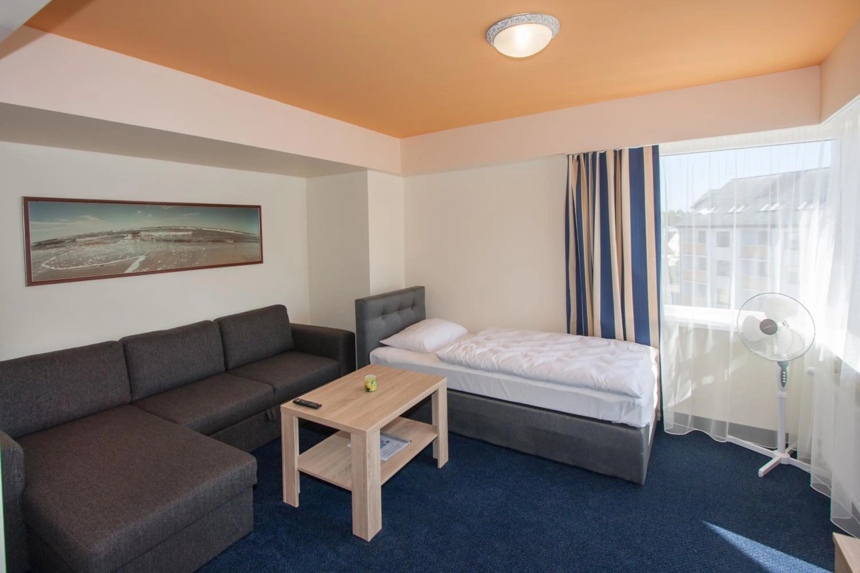 Bed in Tauras Center Hotel