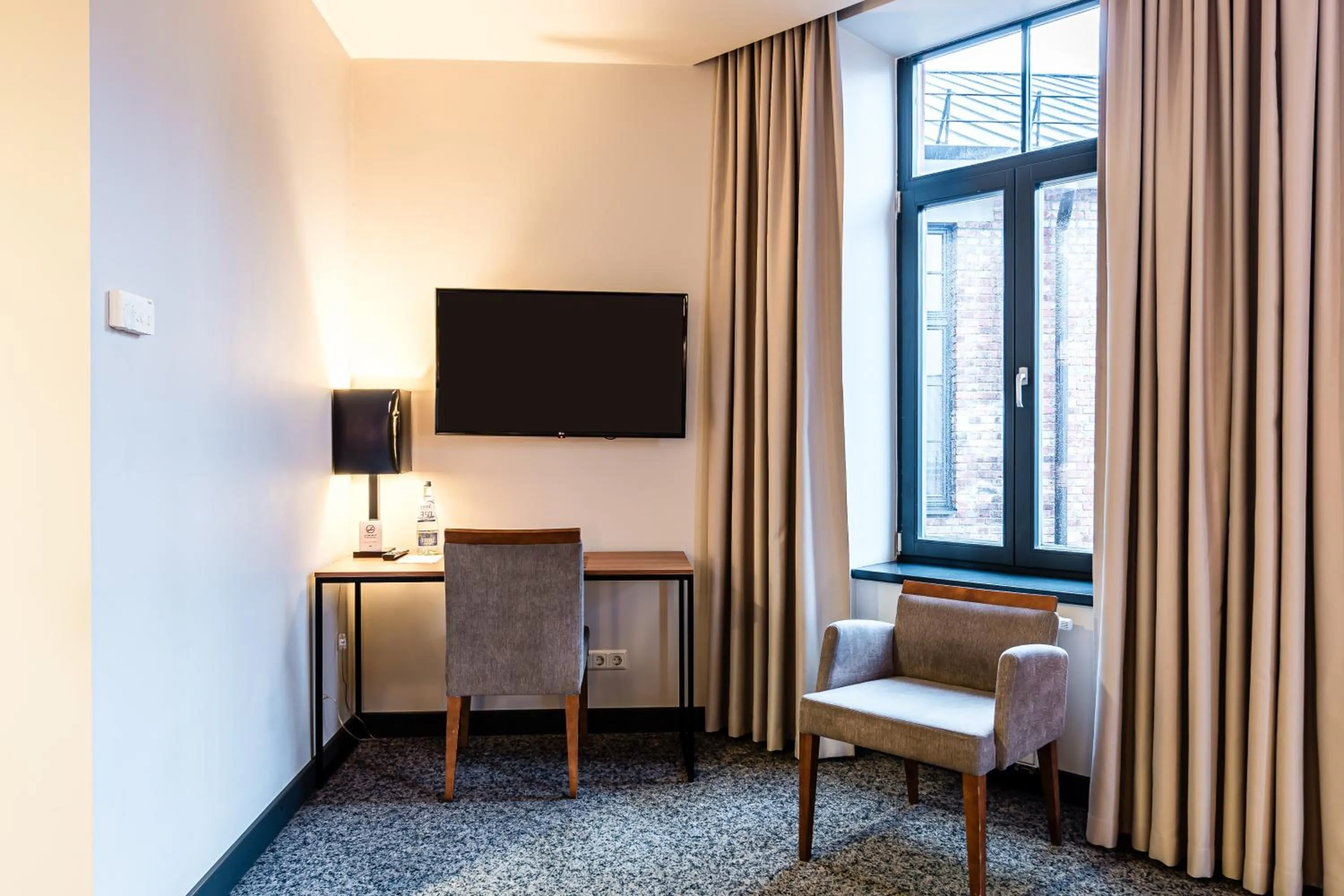 Seating area in VICTORIA Hotel Kaunas