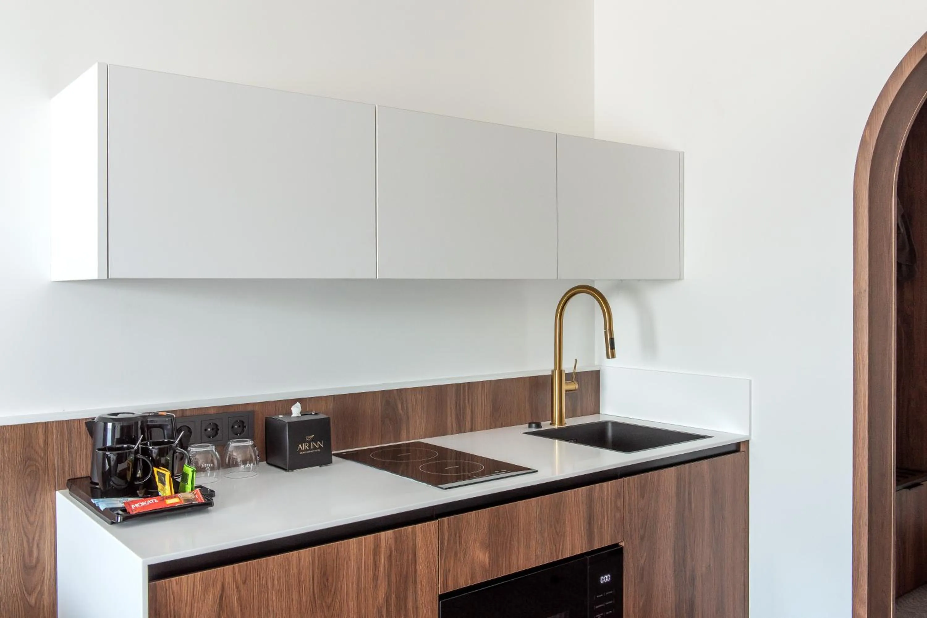 Kitchen or kitchenette in AIRINN Vilnius Airport Hotel RENOVATED 2025