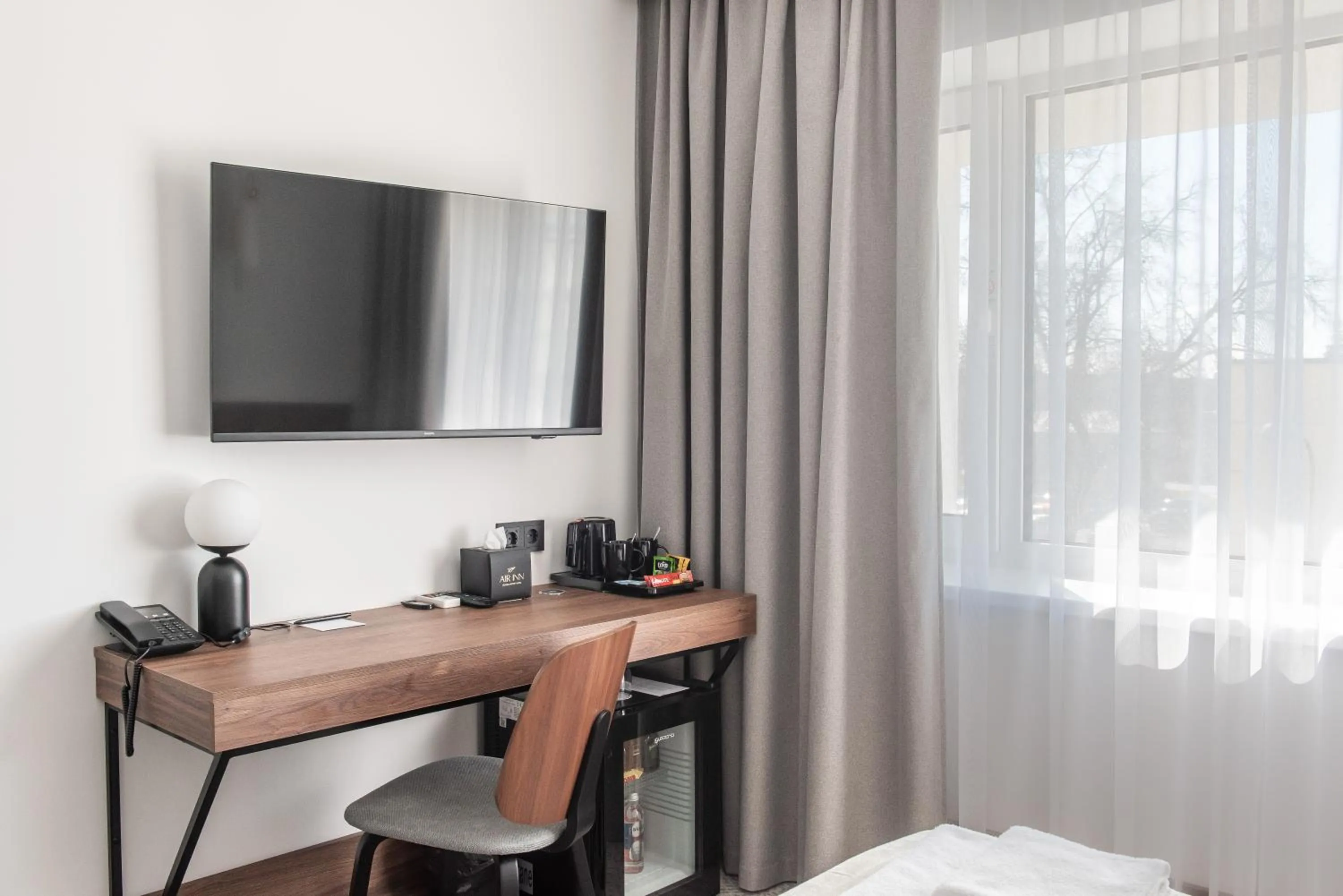 TV and multimedia in AIRINN Vilnius Airport Hotel RENOVATED 2025