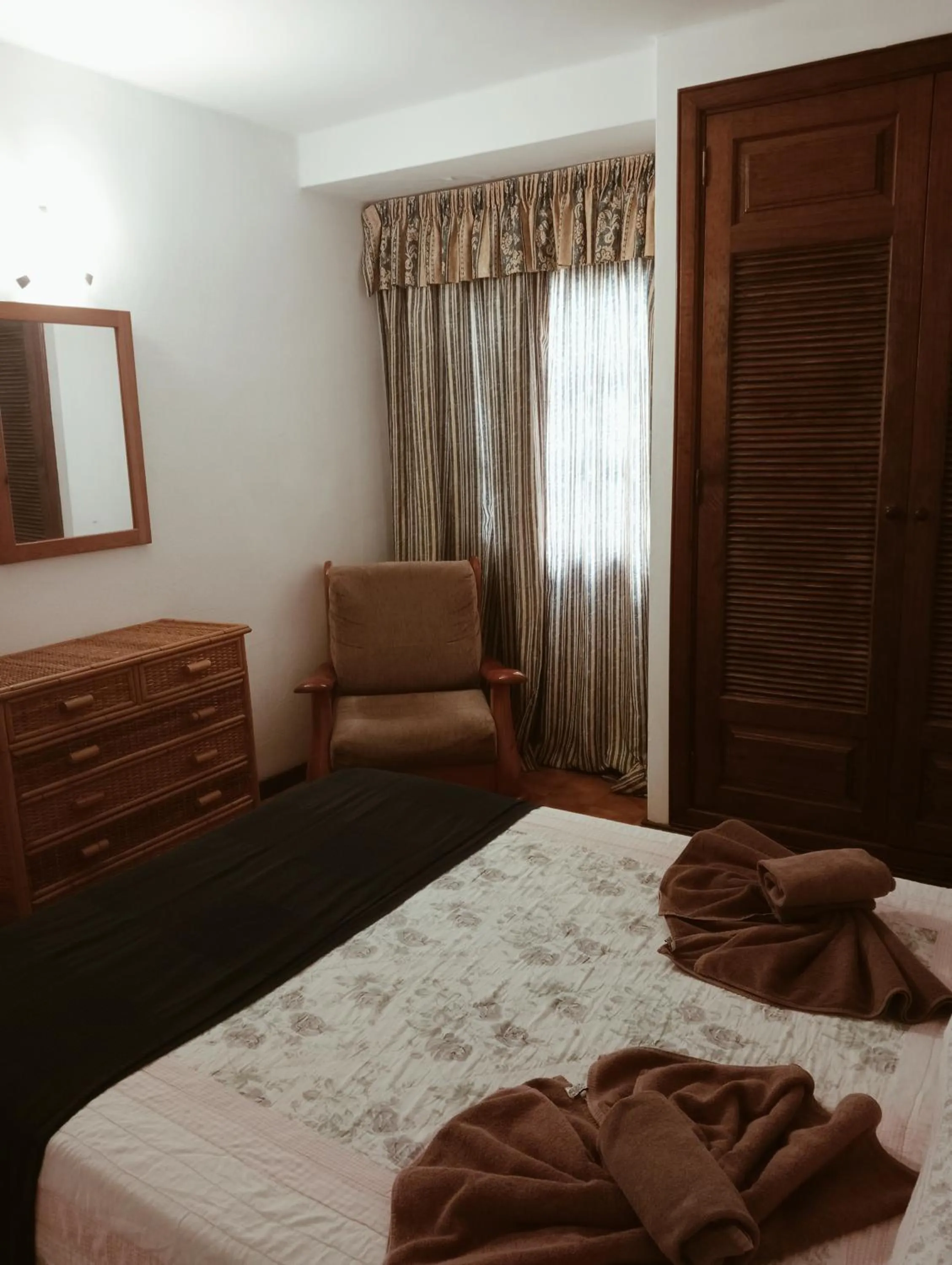 Bed in Apartamentos las Acacias