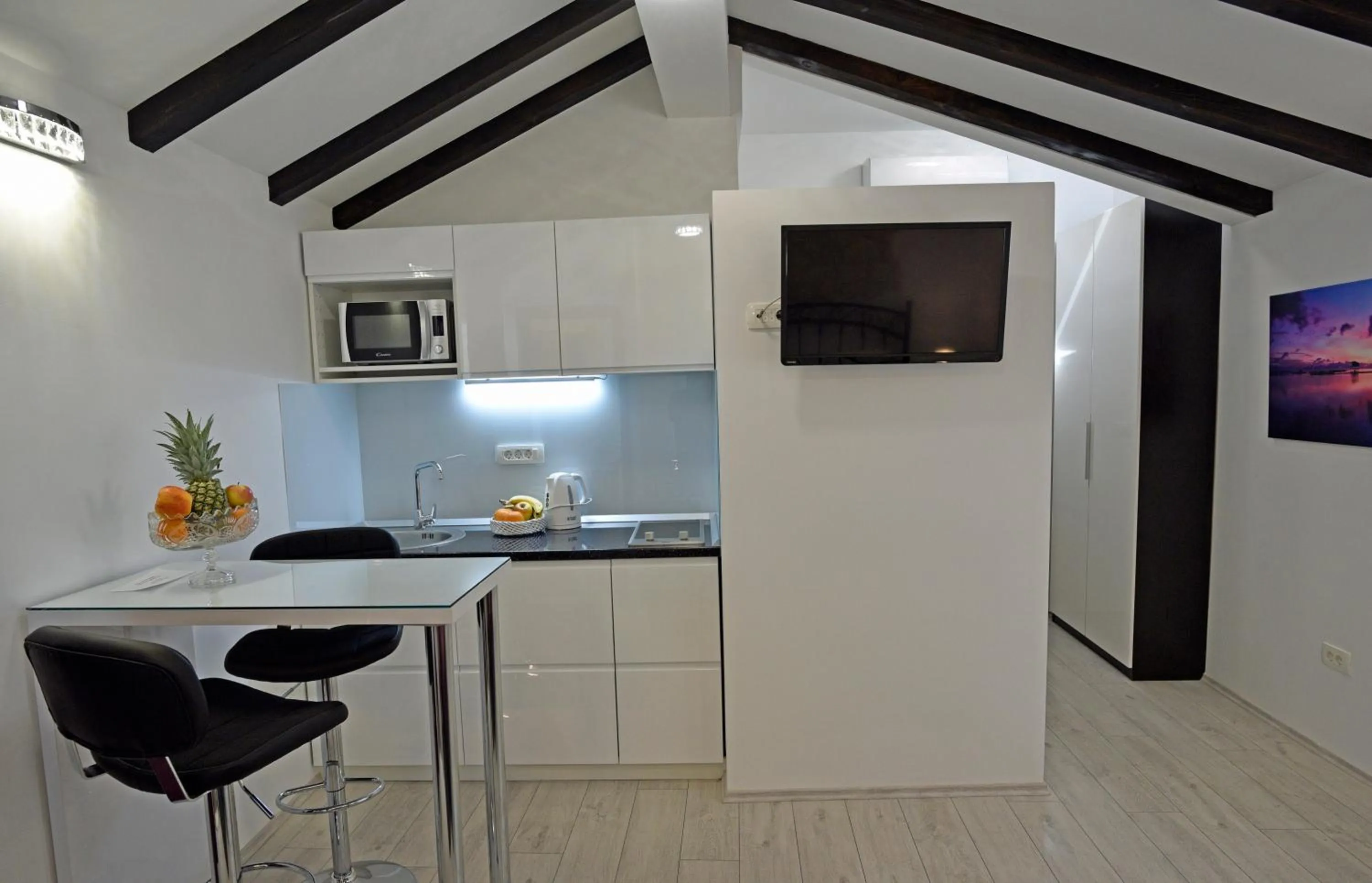 Kitchen or kitchenette in Kuzma Rooms and Apartments