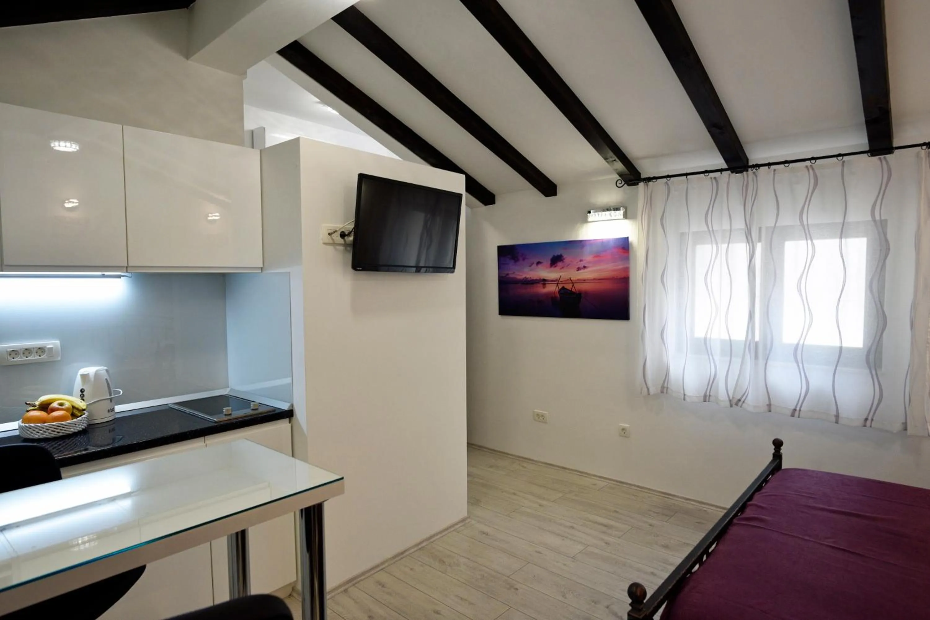 Kitchen or kitchenette in Kuzma Rooms and Apartments