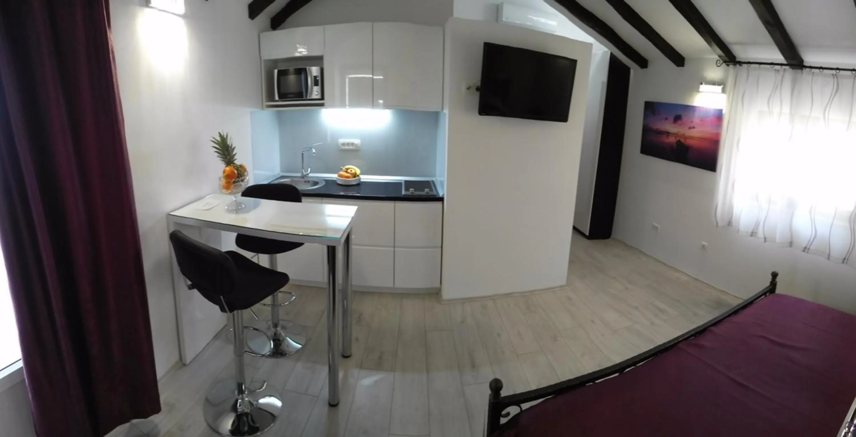 Kitchen or kitchenette in Kuzma Rooms and Apartments