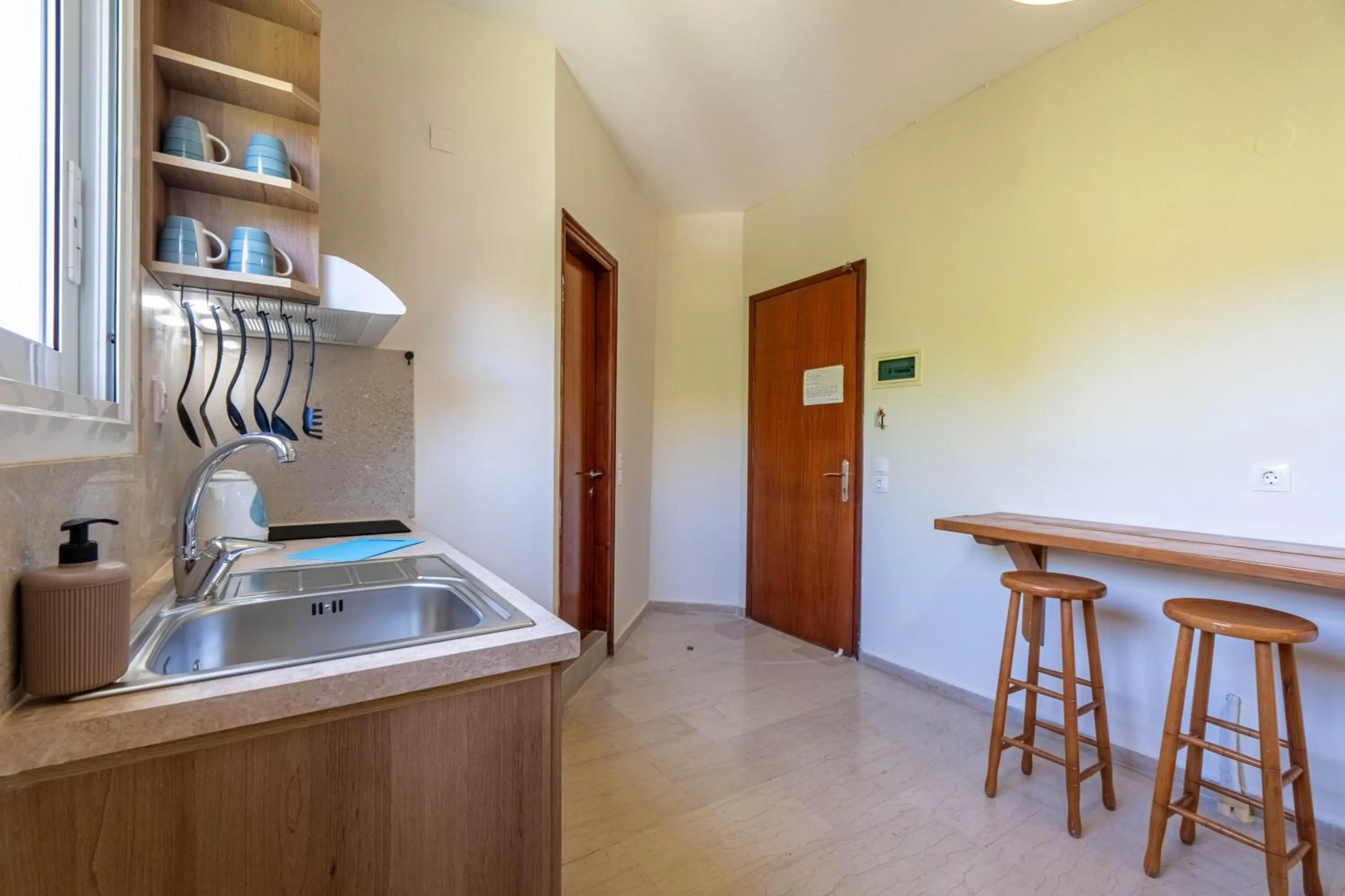 Kitchen or kitchenette in Angela Hotel & Apartments