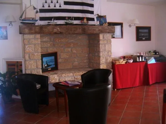 Seating area in Hôtel Le Chevalier Gambette