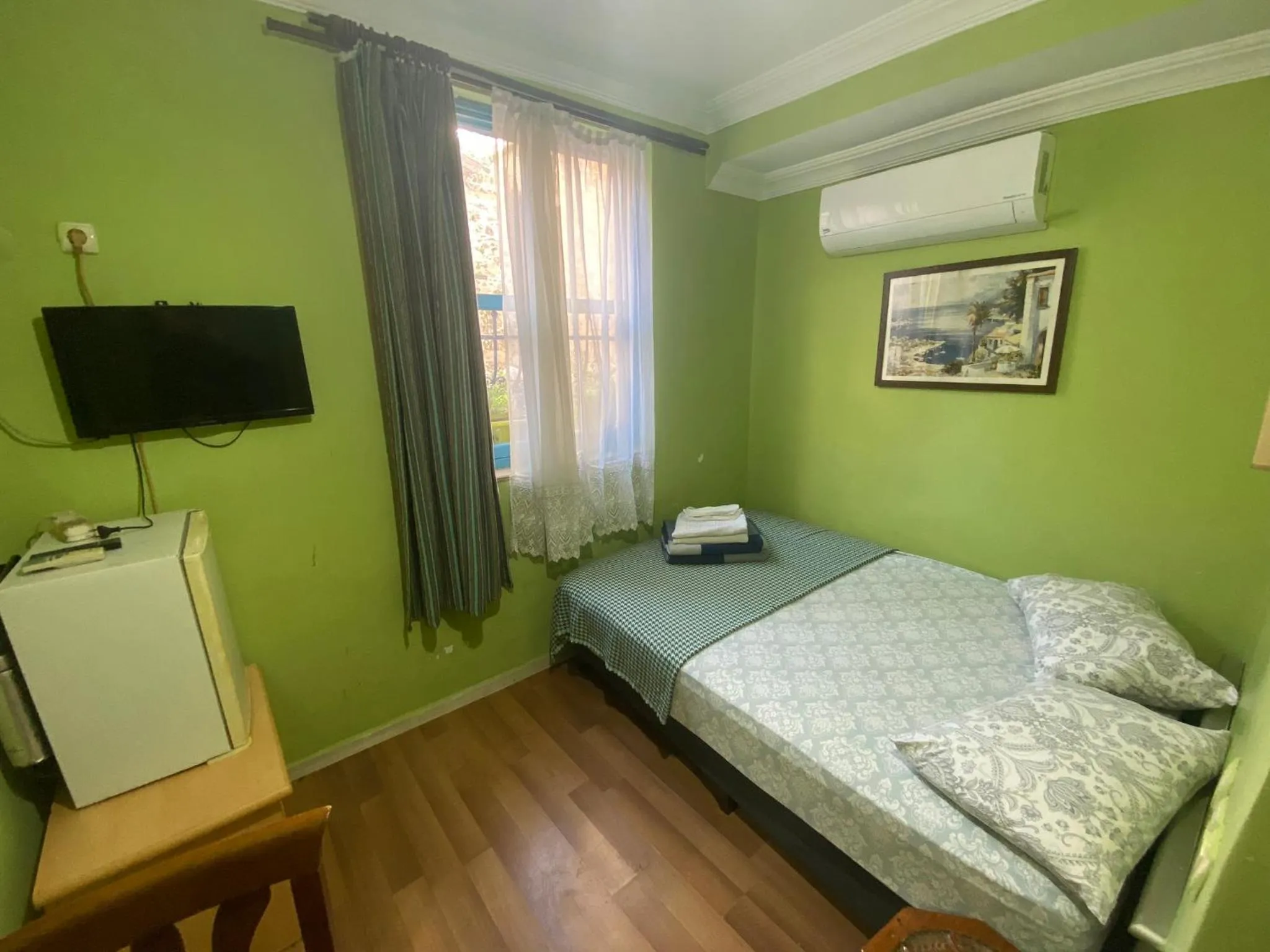 Bed in Camel Hotel & Apart