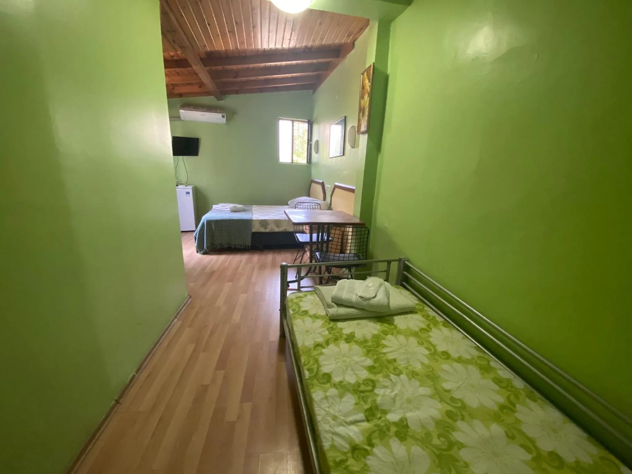 Bed in Camel Hotel & Apart