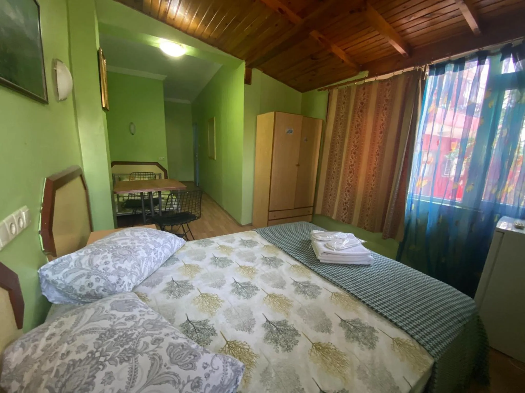 Bed in Camel Hotel & Apart