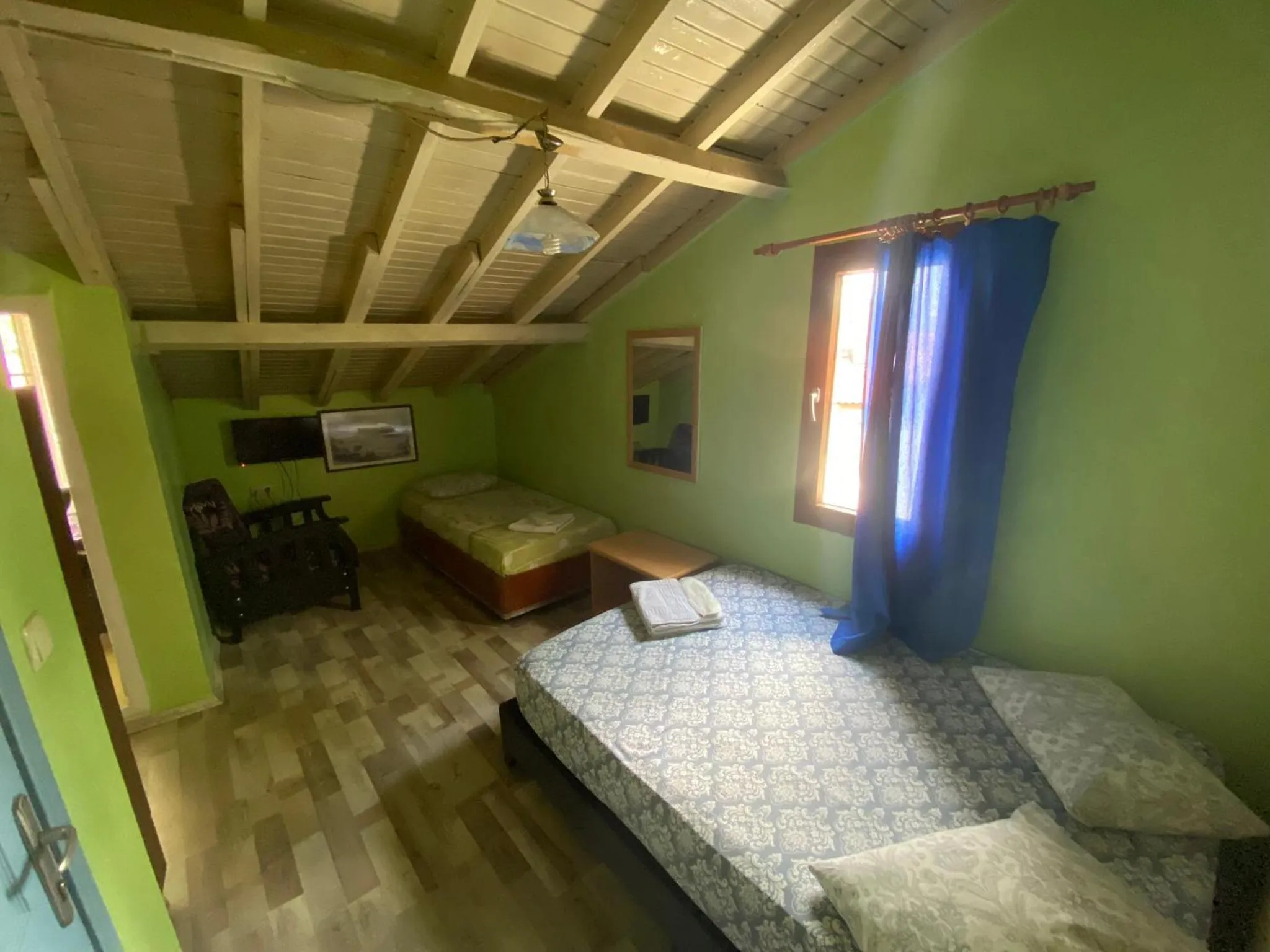 Bed in Camel Hotel & Apart