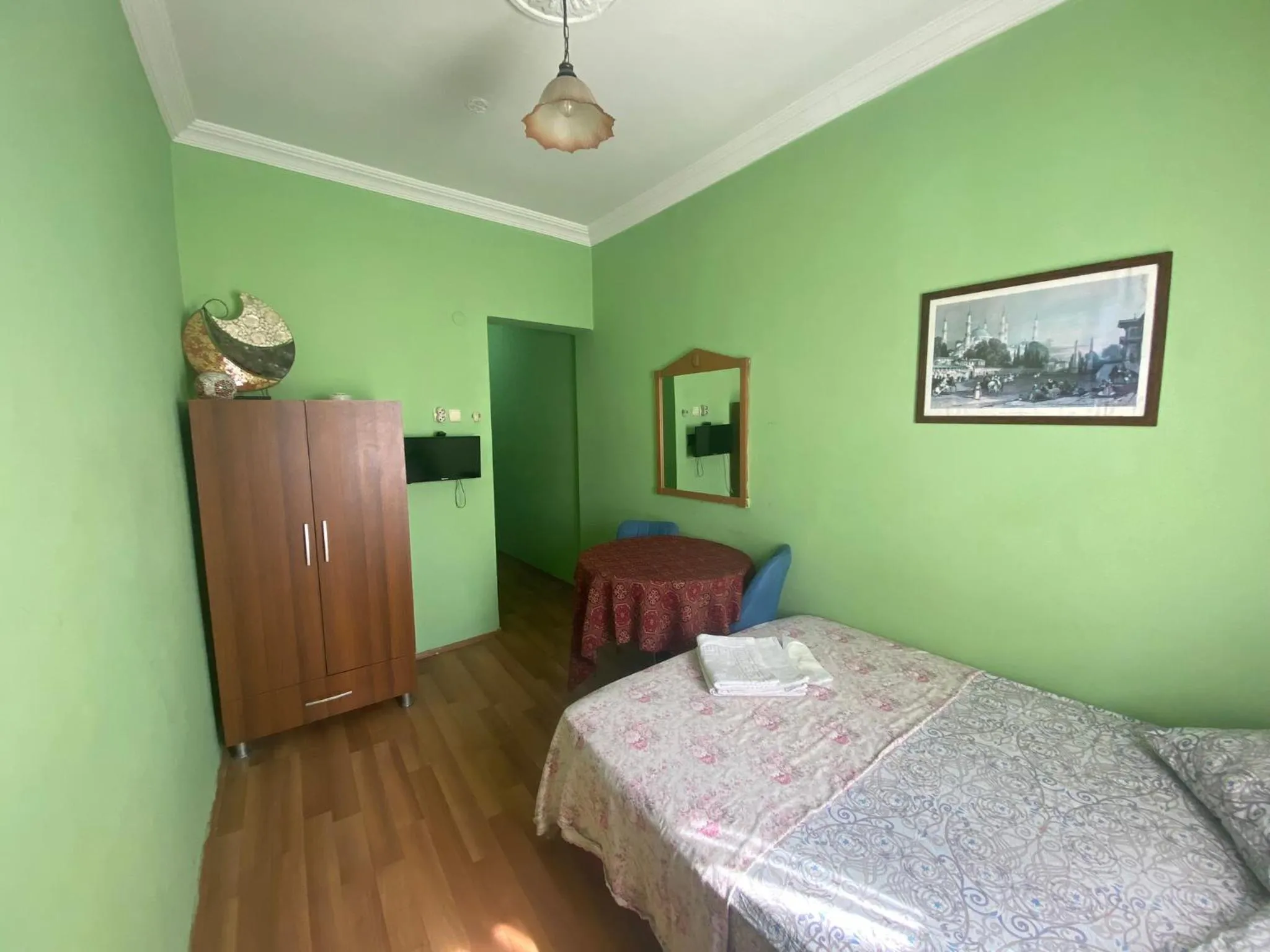 Bed in Camel Hotel & Apart