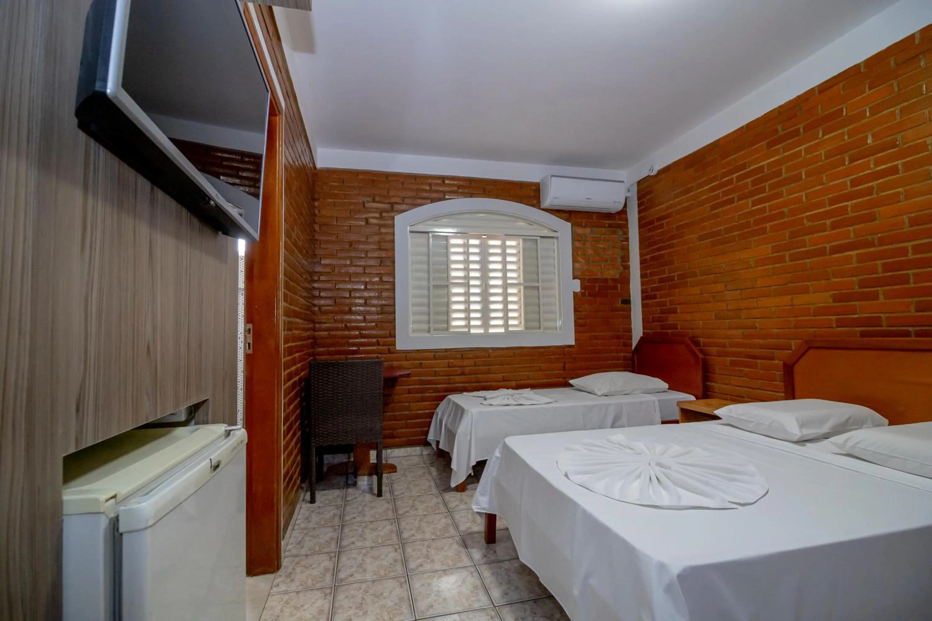 Photo of the whole room, Bed in Pousada Recanto das Caldas