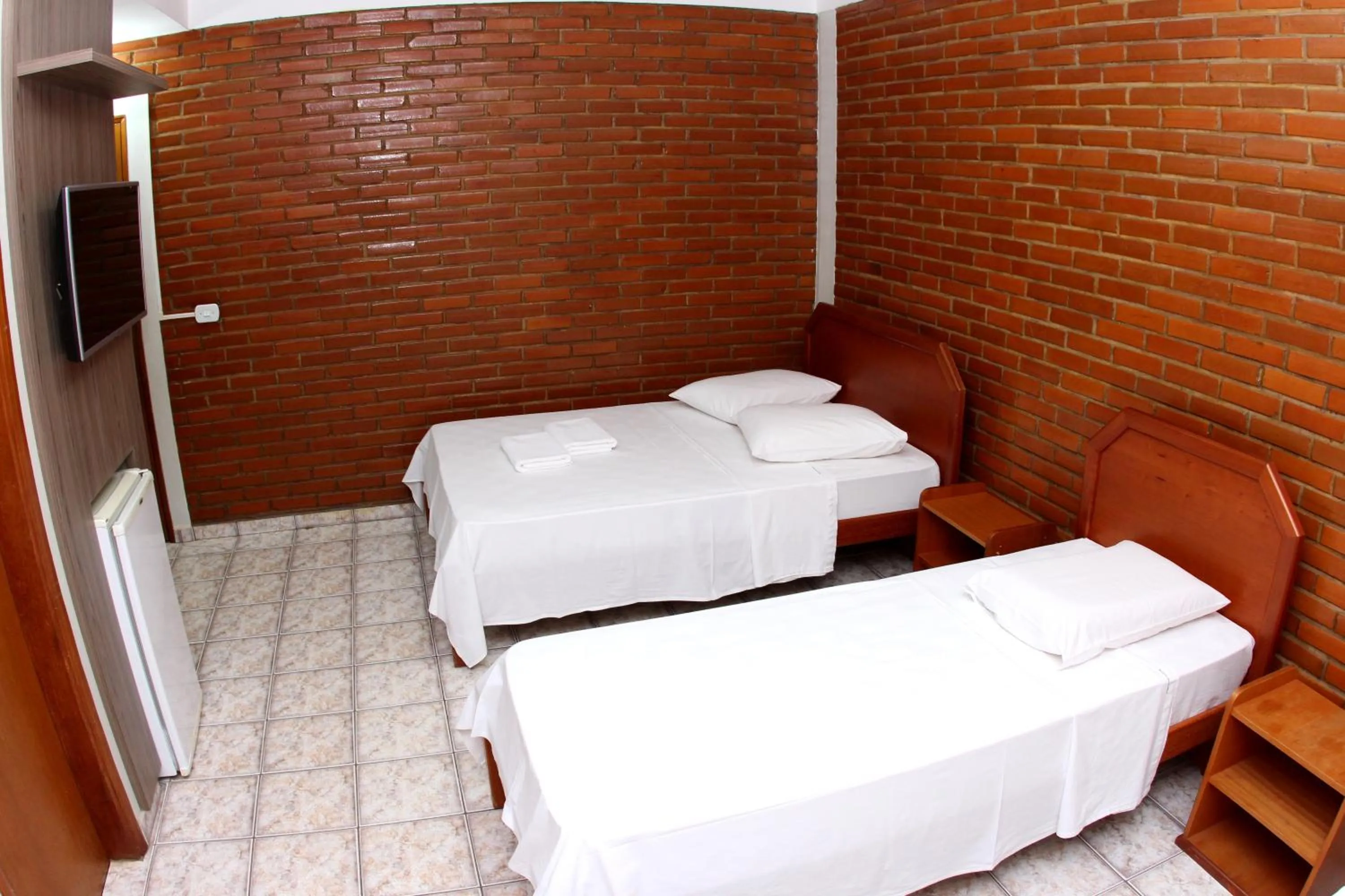 Bedroom, Bed in Pousada Recanto das Caldas