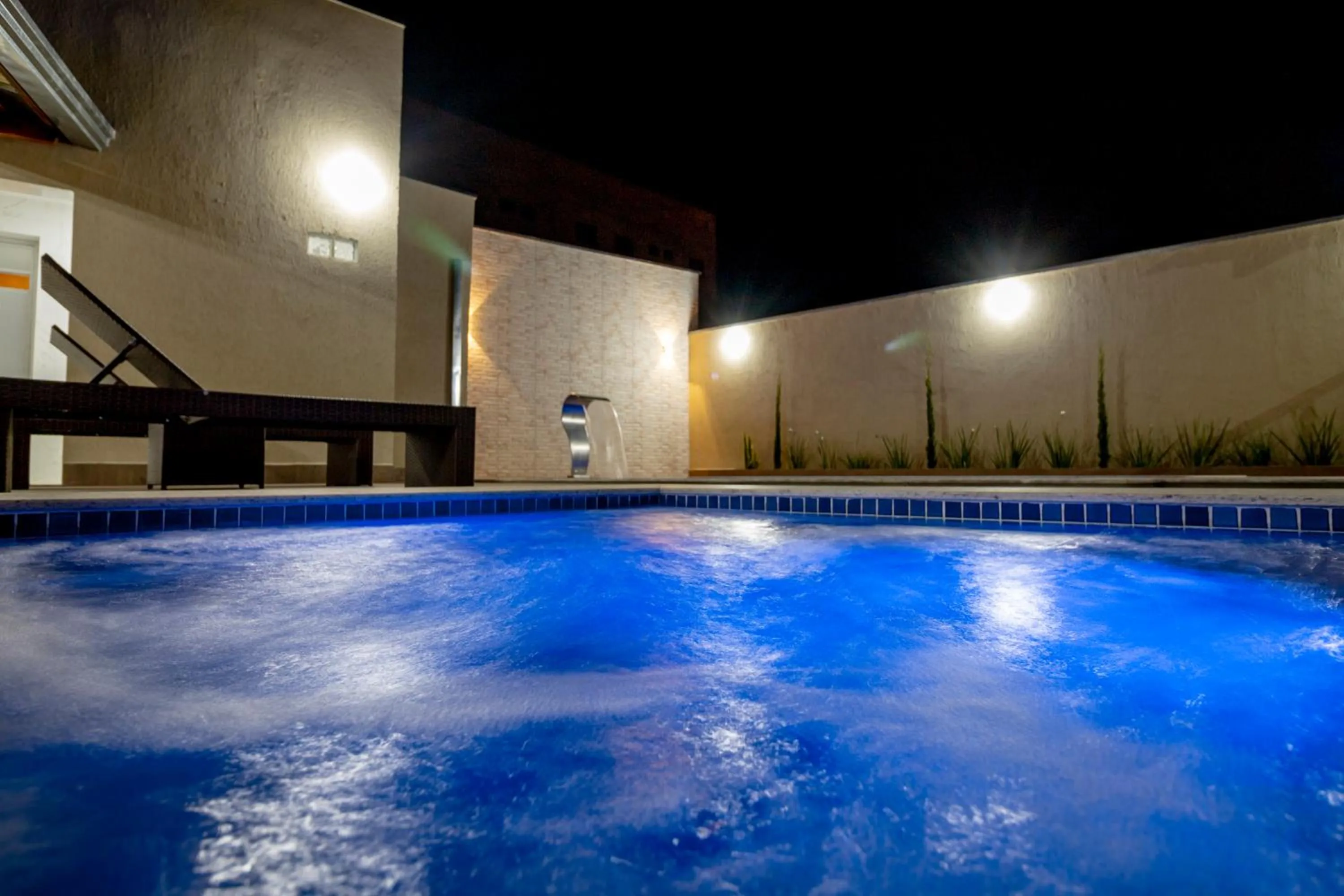 Swimming pool in Pousada Recanto das Caldas