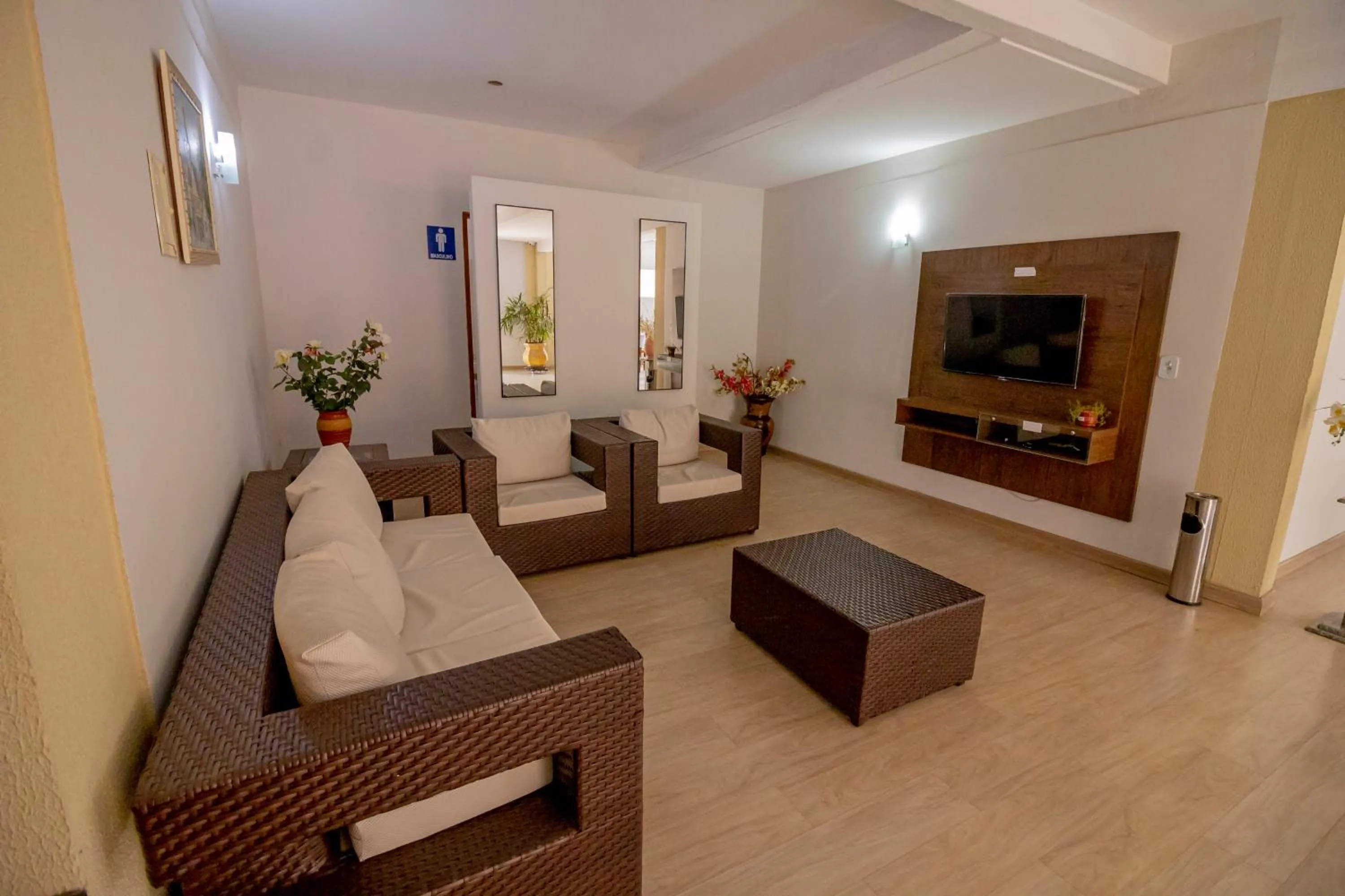 Communal lounge/ TV room in Pousada Recanto das Caldas