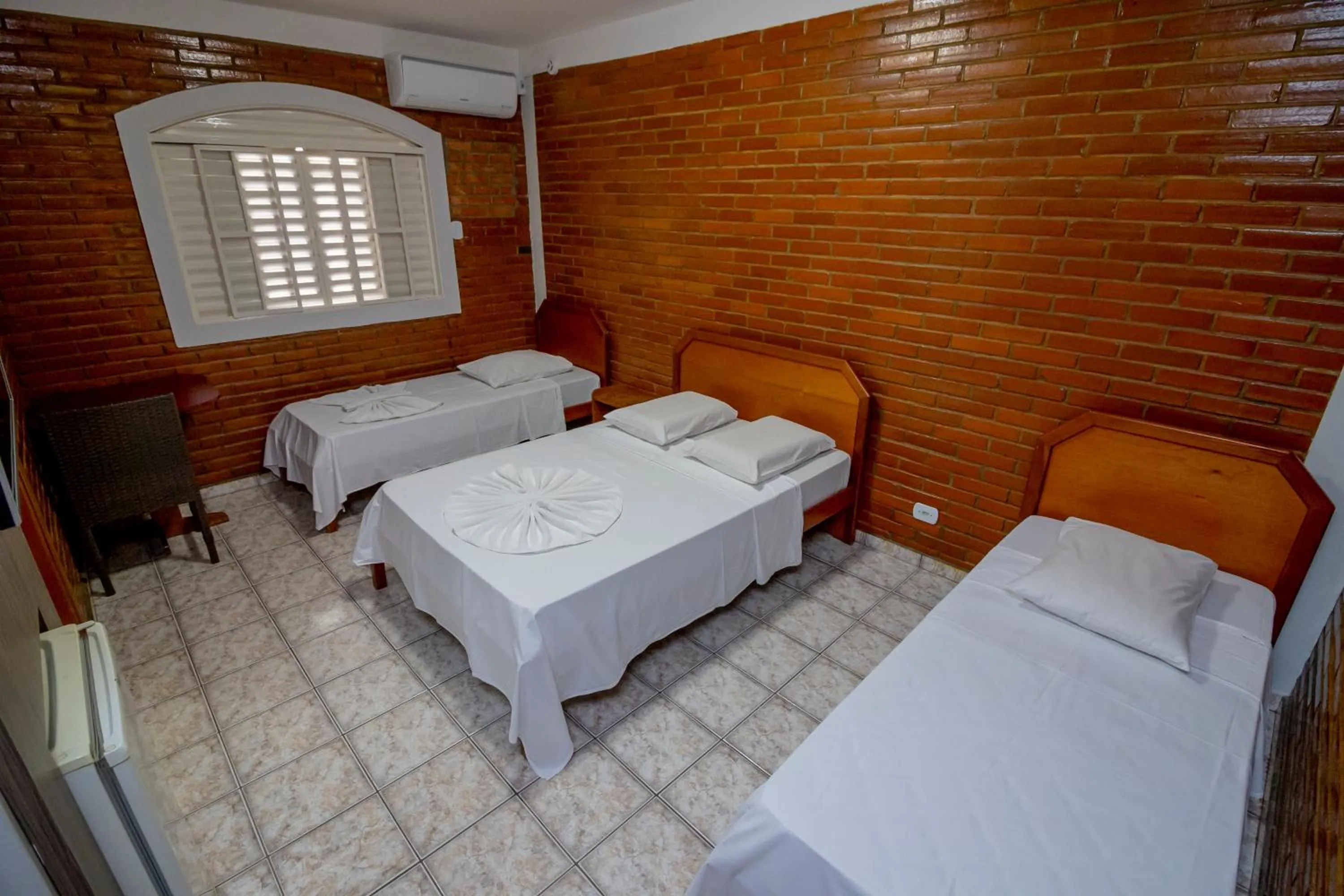 Photo of the whole room, Bed in Pousada Recanto das Caldas