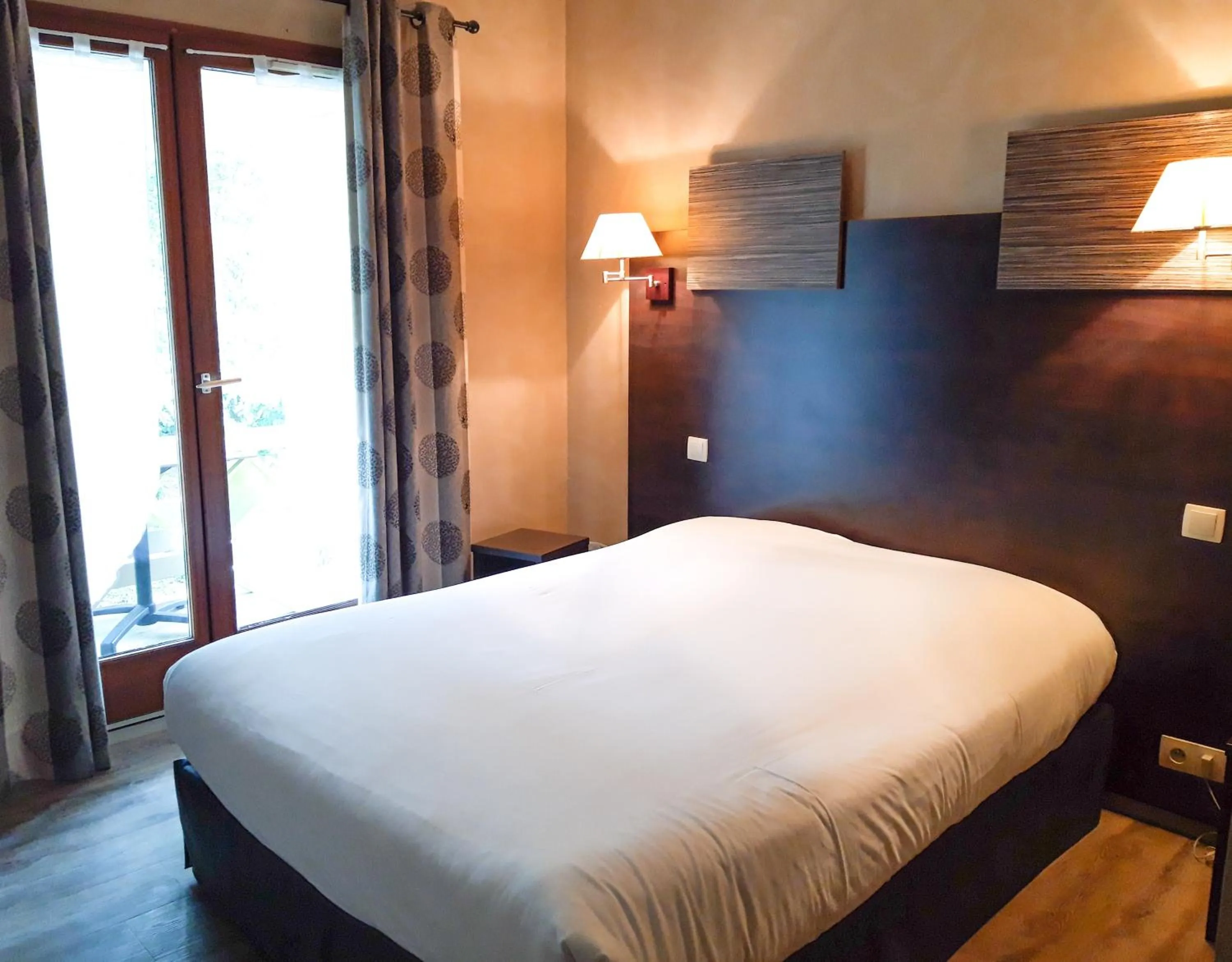 Bed in Hotel Alicia Auray Le Bono