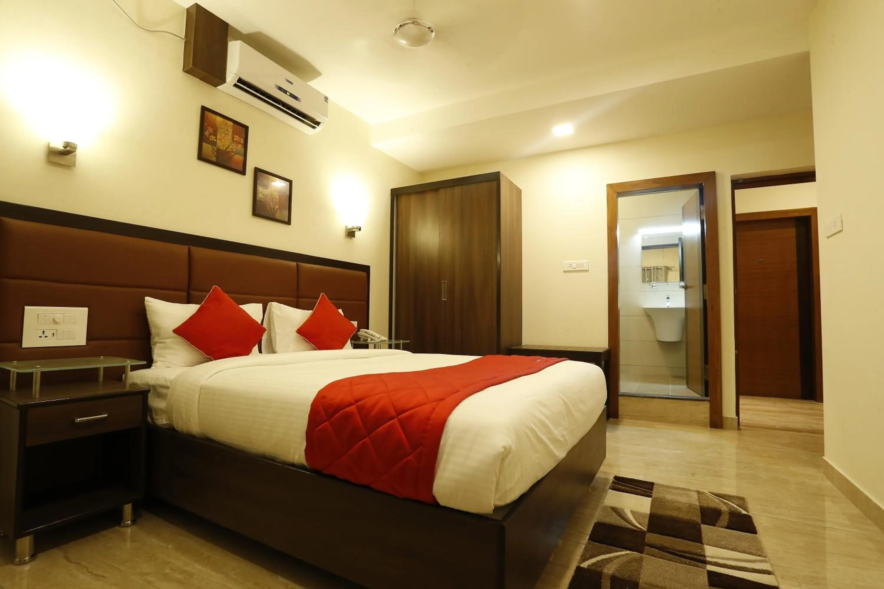 Bed in D Breeze Suites