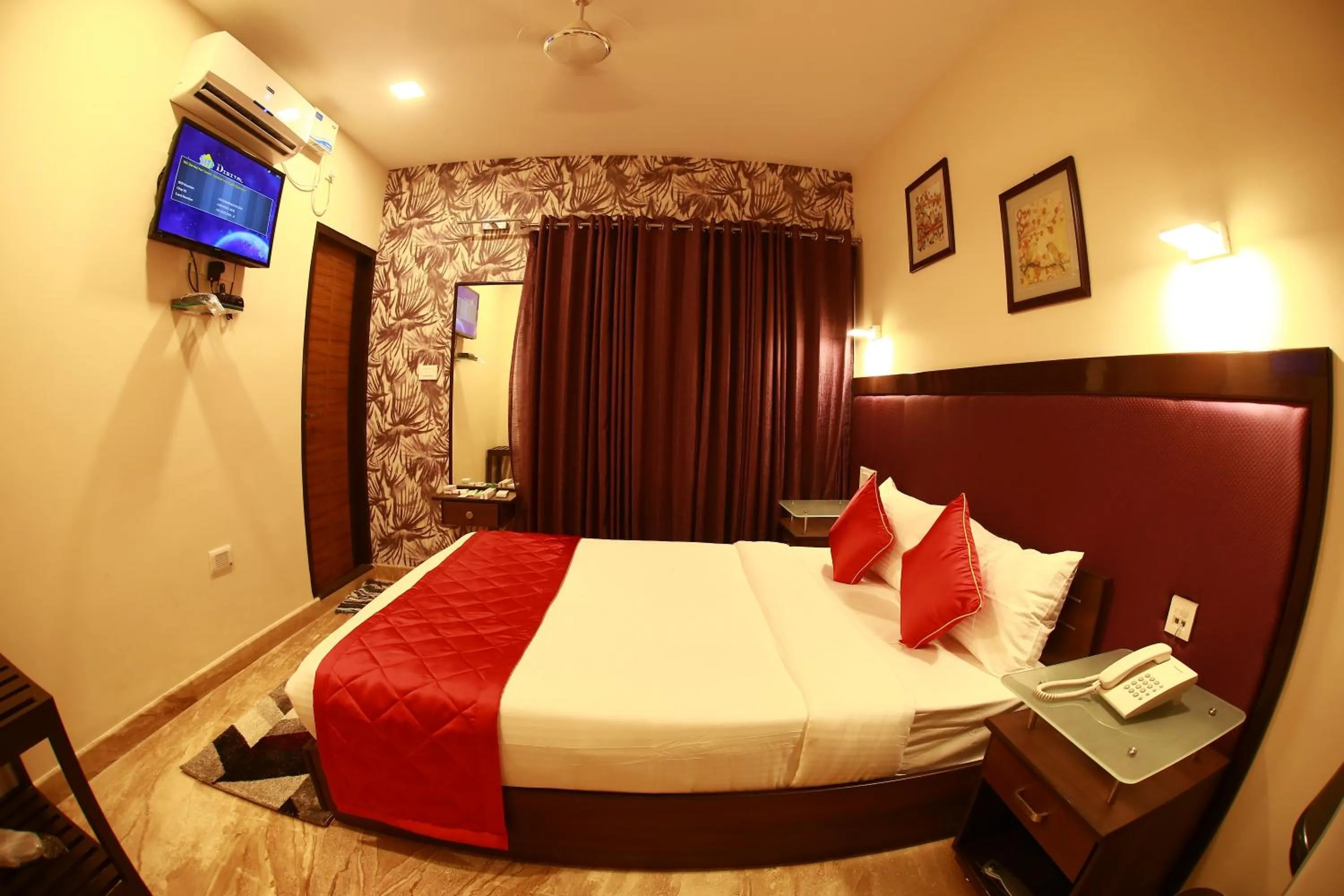 Bed in D Breeze Suites