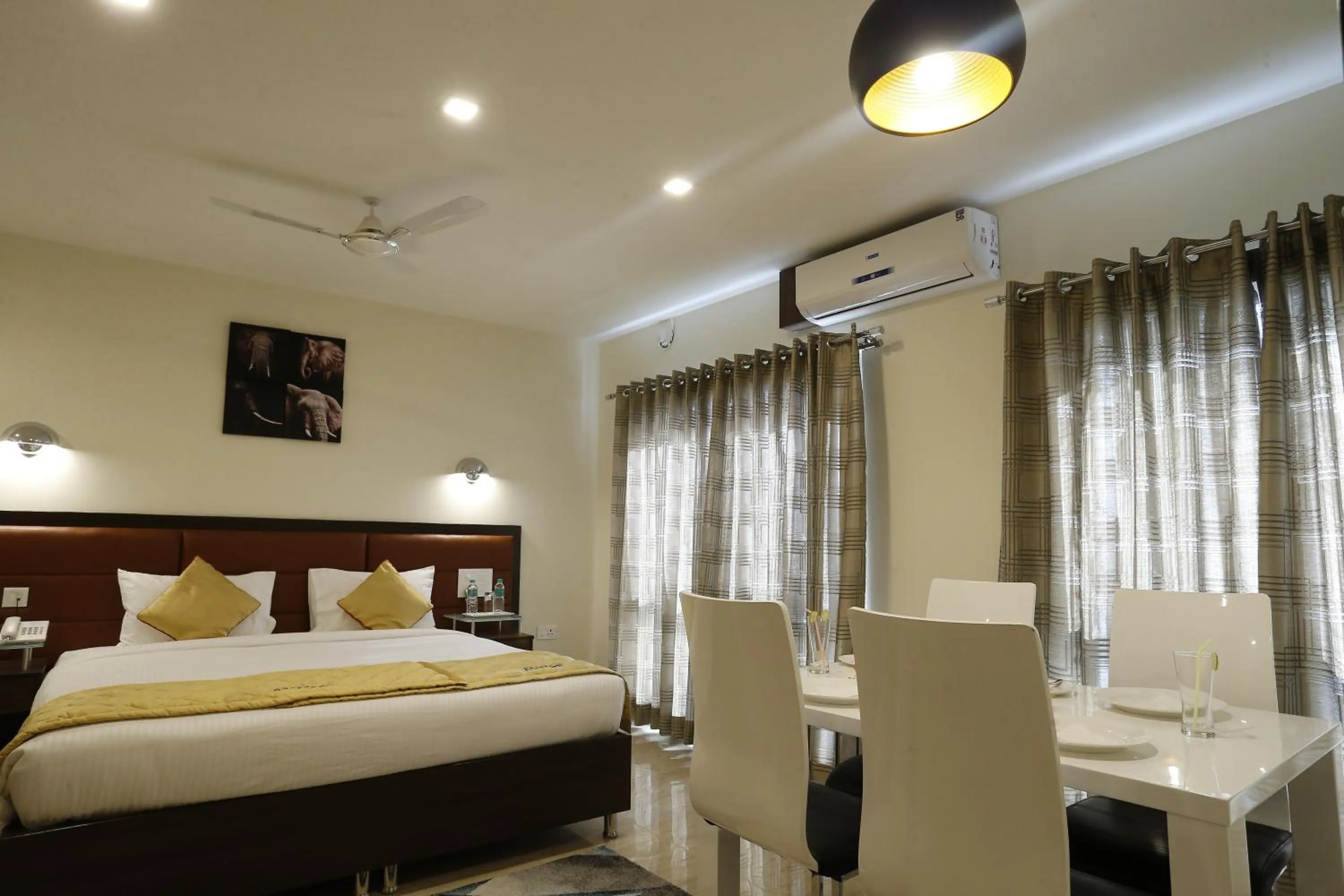 Bed in D Breeze Suites