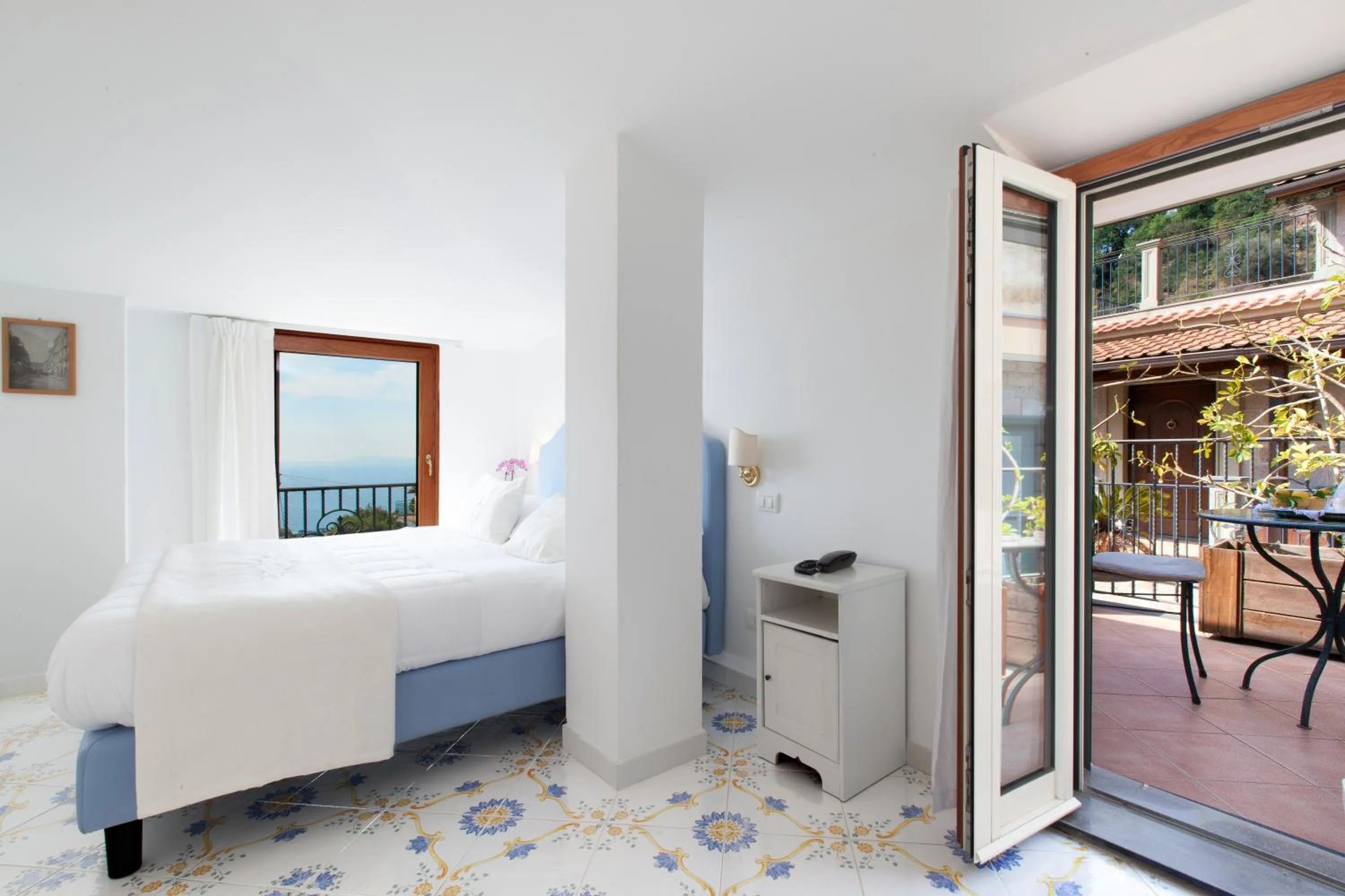 Patio, Bed in Villa Pane Resort