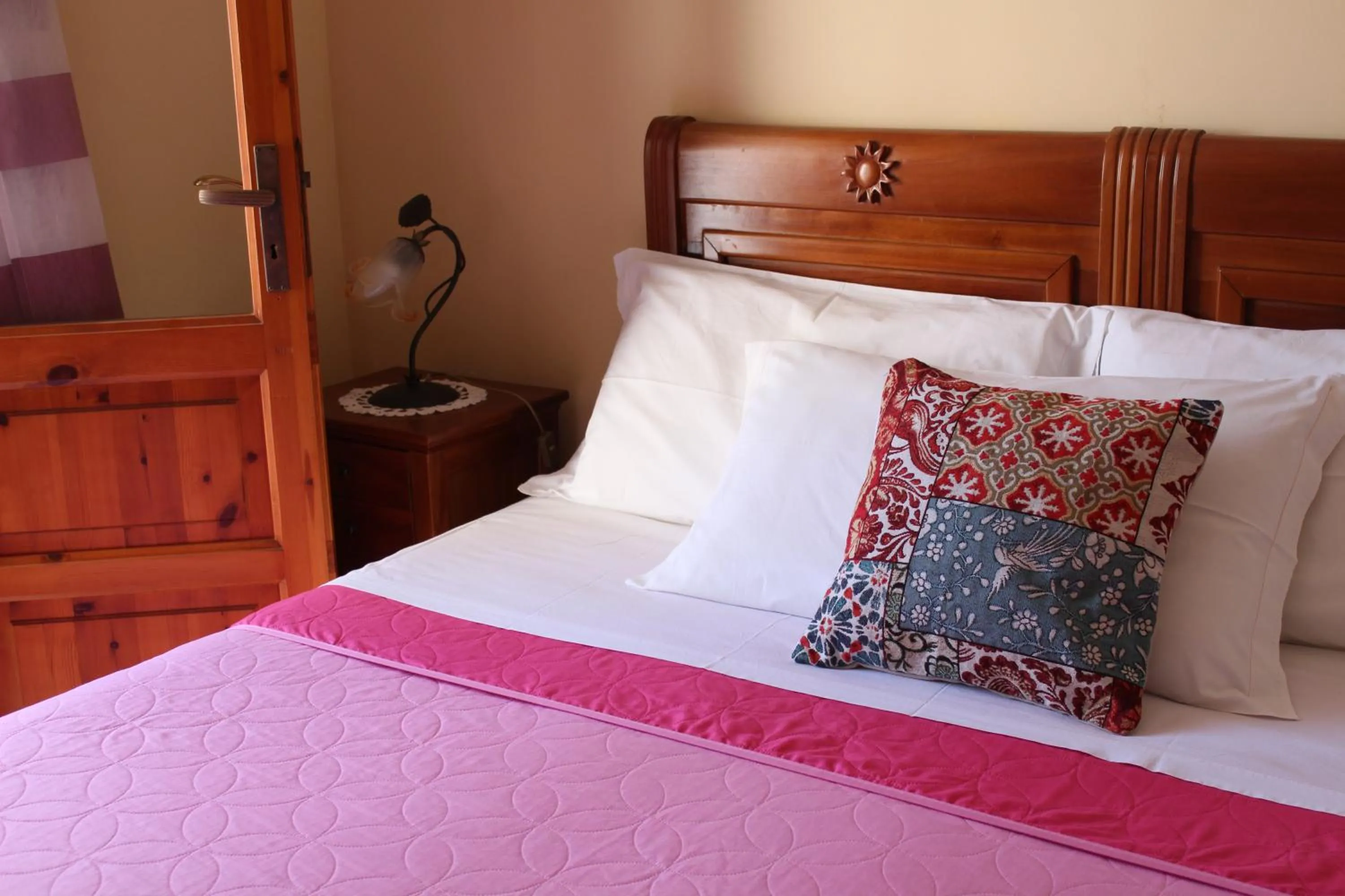 Bed in Raggio di Sole Bed & Breakfast