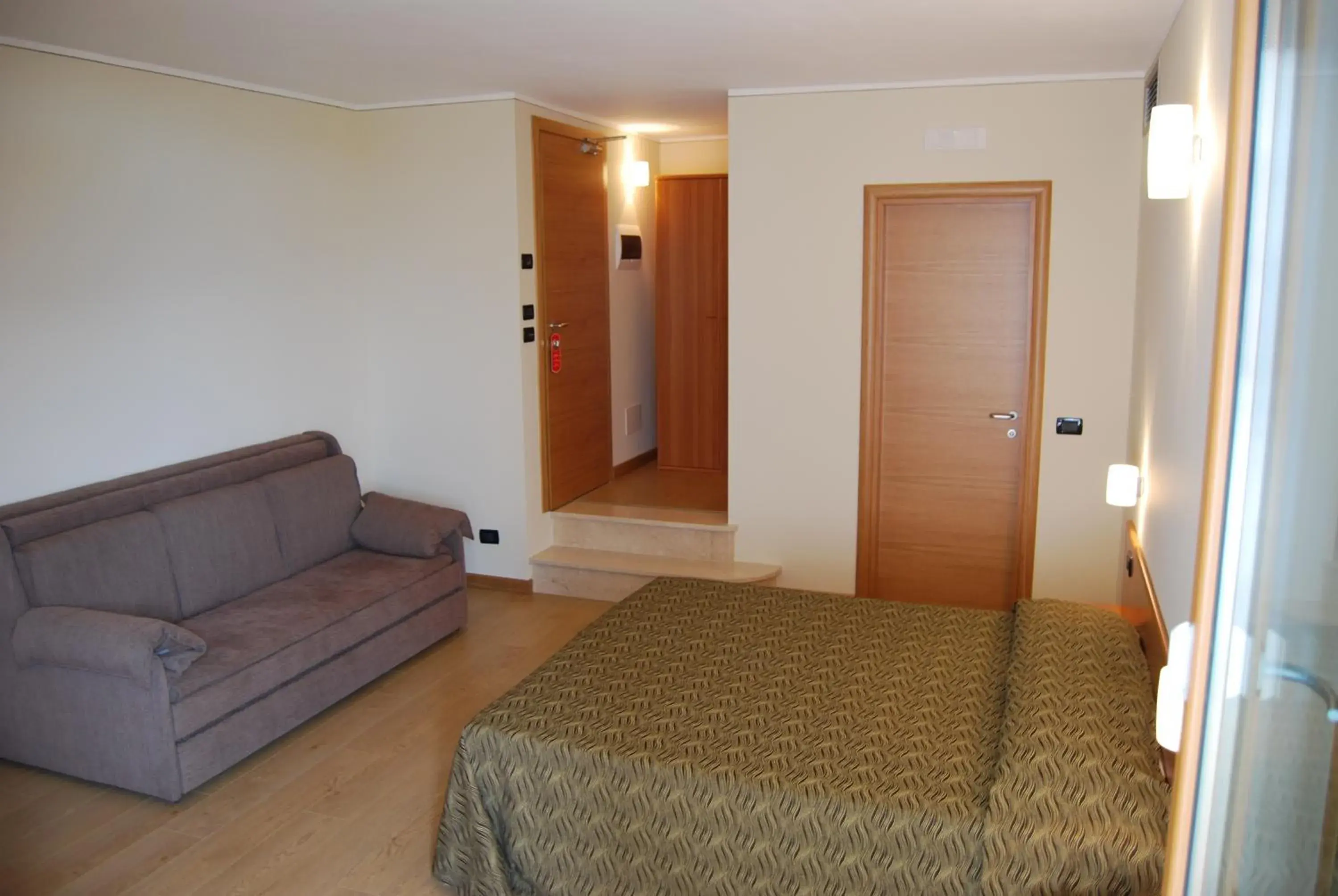 Triple Room with Lake View in Albergo Ristorante Orazio Triple Room with Lake View in Albergo Ristorante Orazio