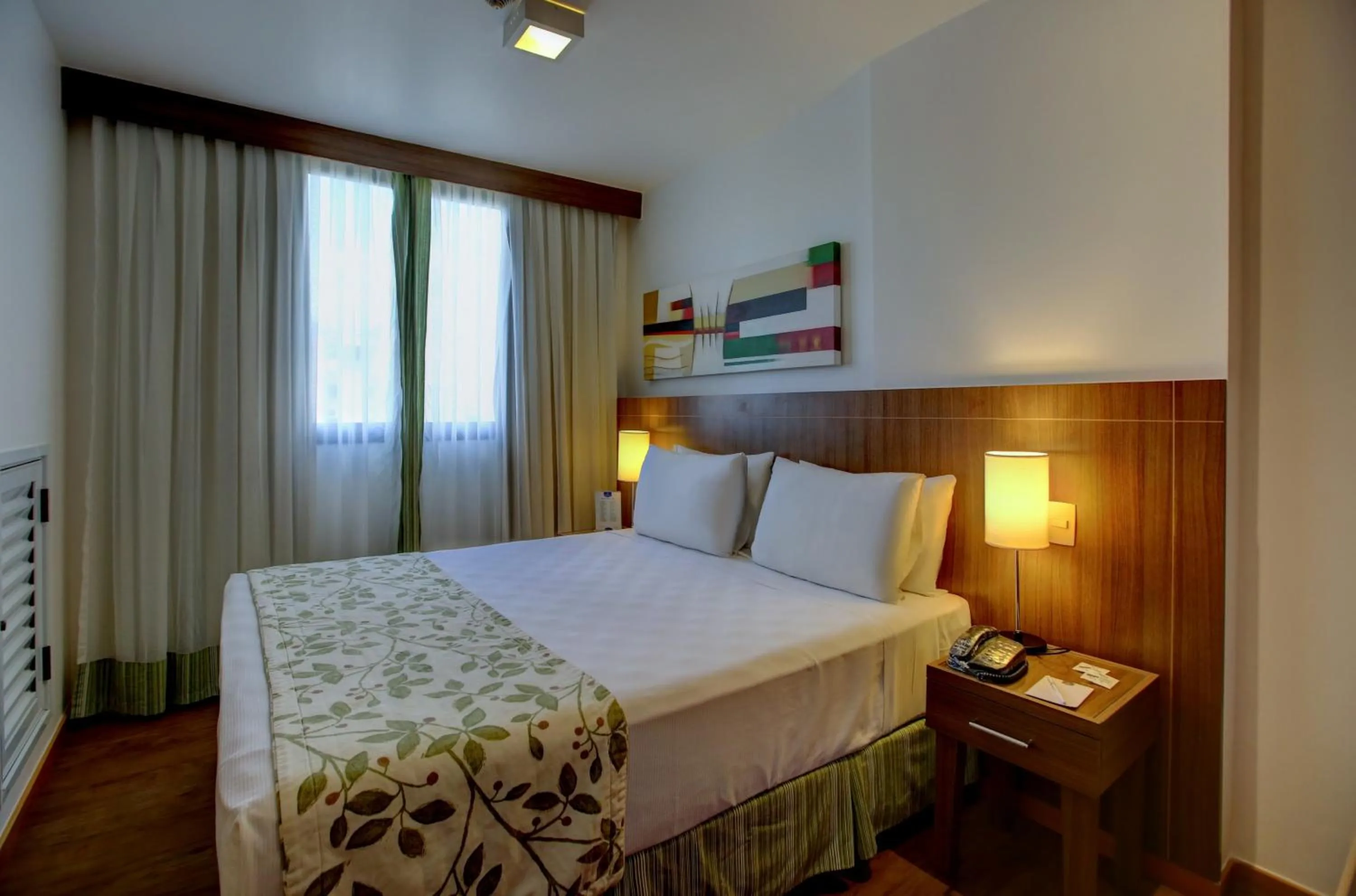 Bed in Nobile Suites Monumental