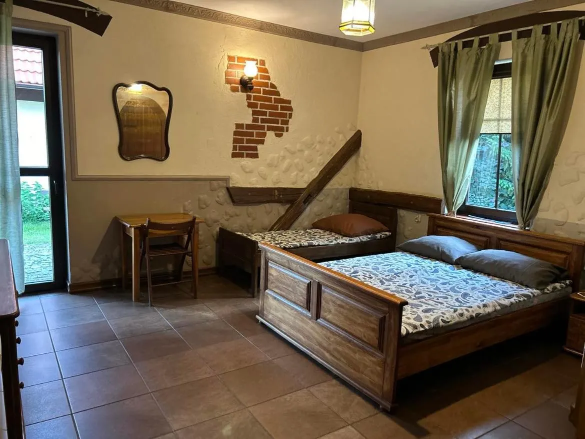 Bed in Pokoje i domki Saraceńska Chata