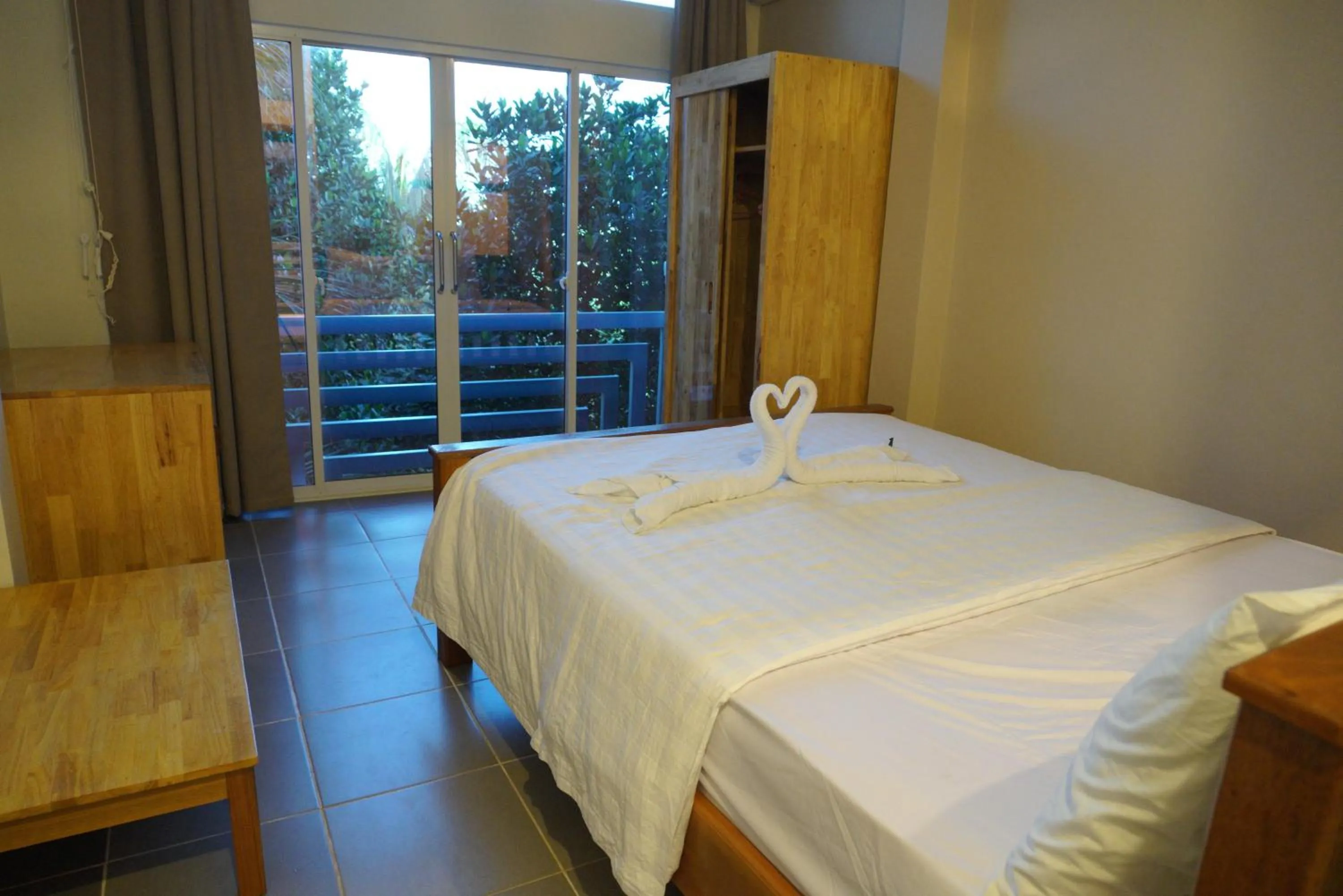 Photo of the whole room, Bed in Sok Heng Guesthouse