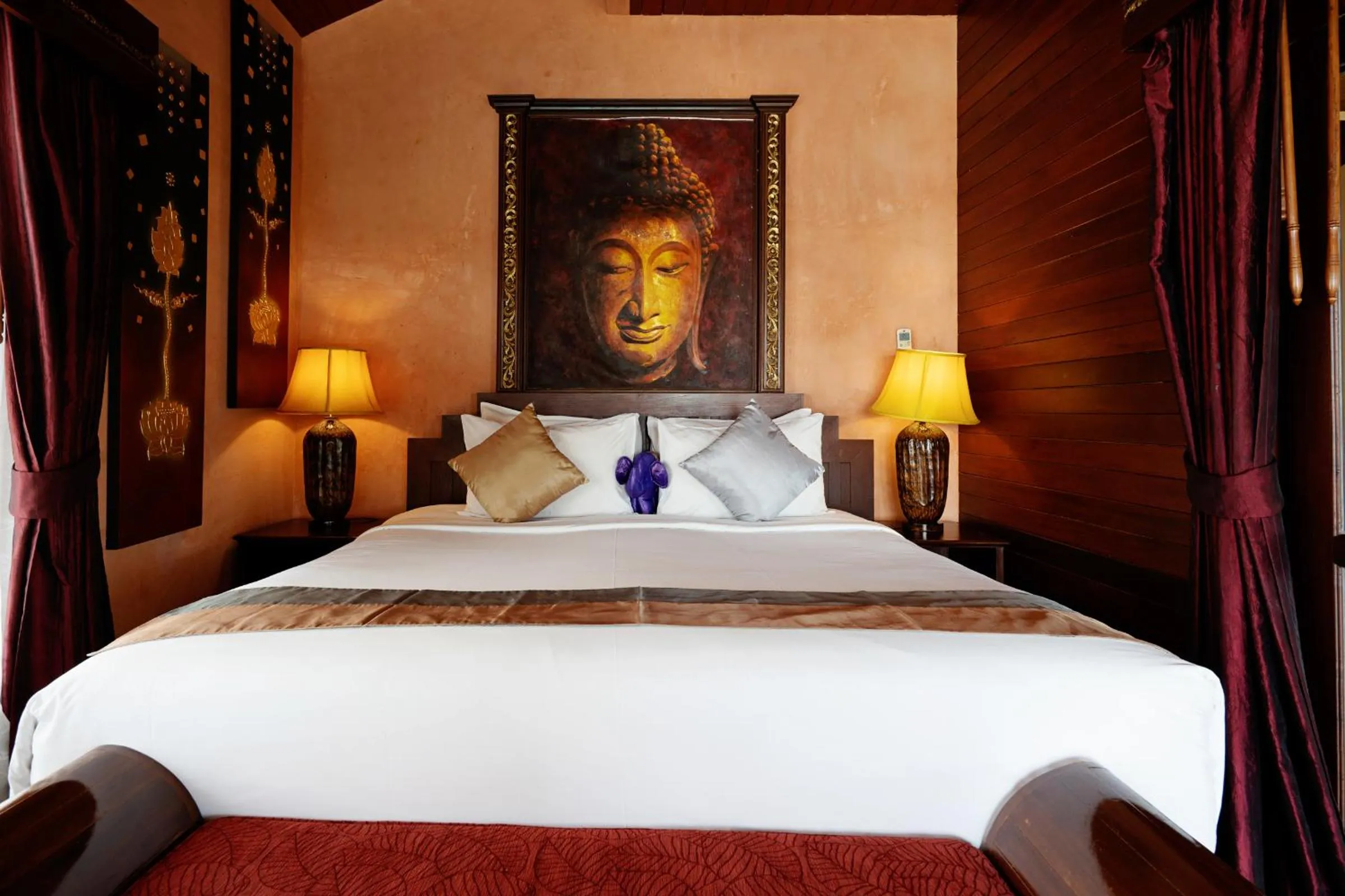 Bed in Sandalwood Luxury Villa Resort
