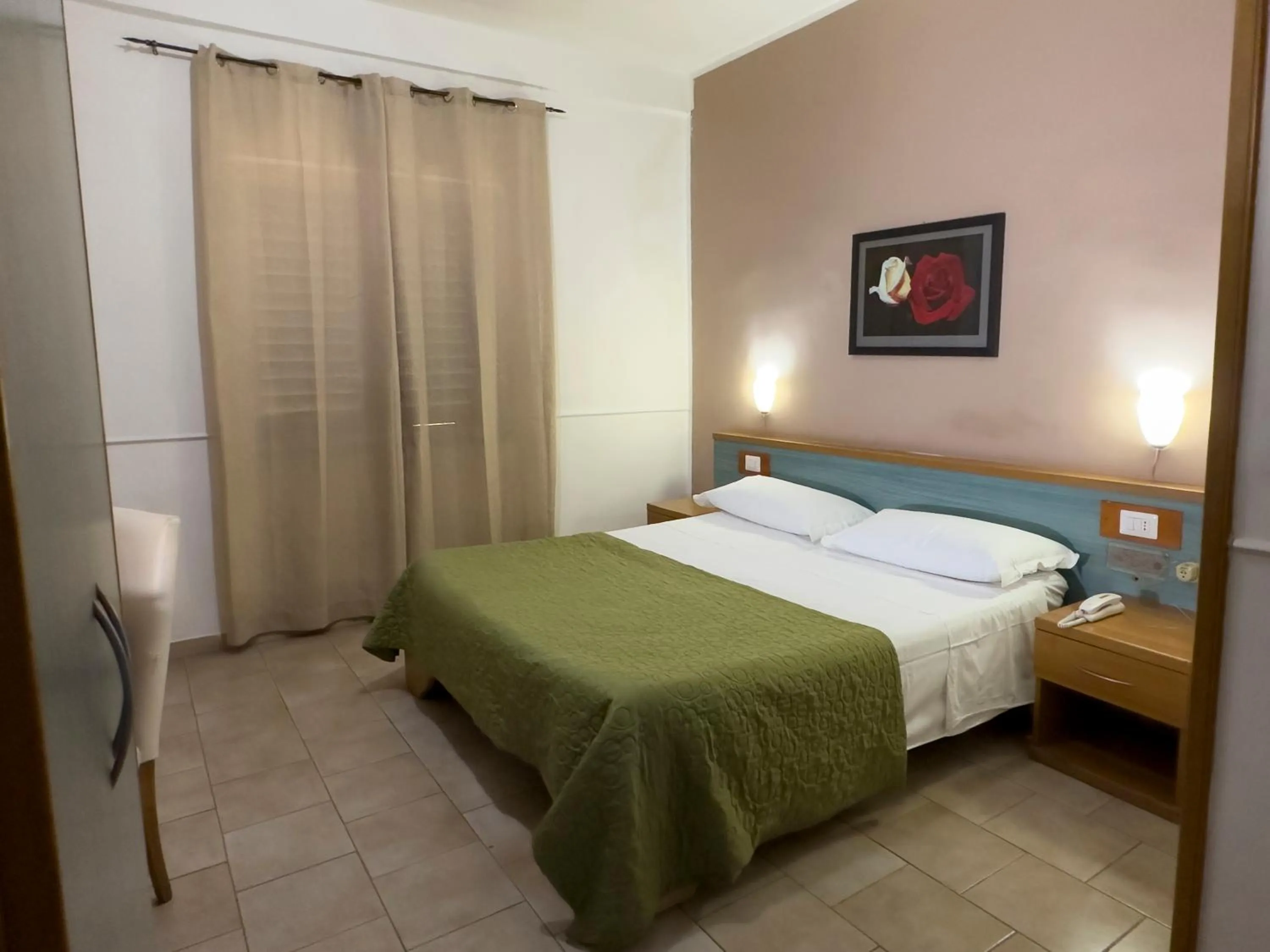 Bed in Hotel Martini