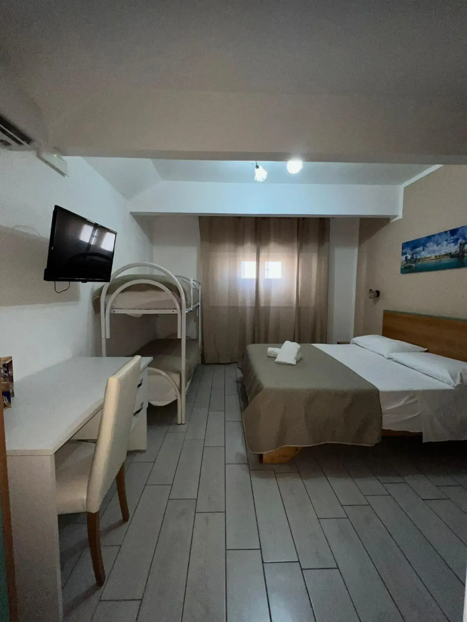 Quadruple Room in Hotel Martini Quadruple Room in Hotel Martini