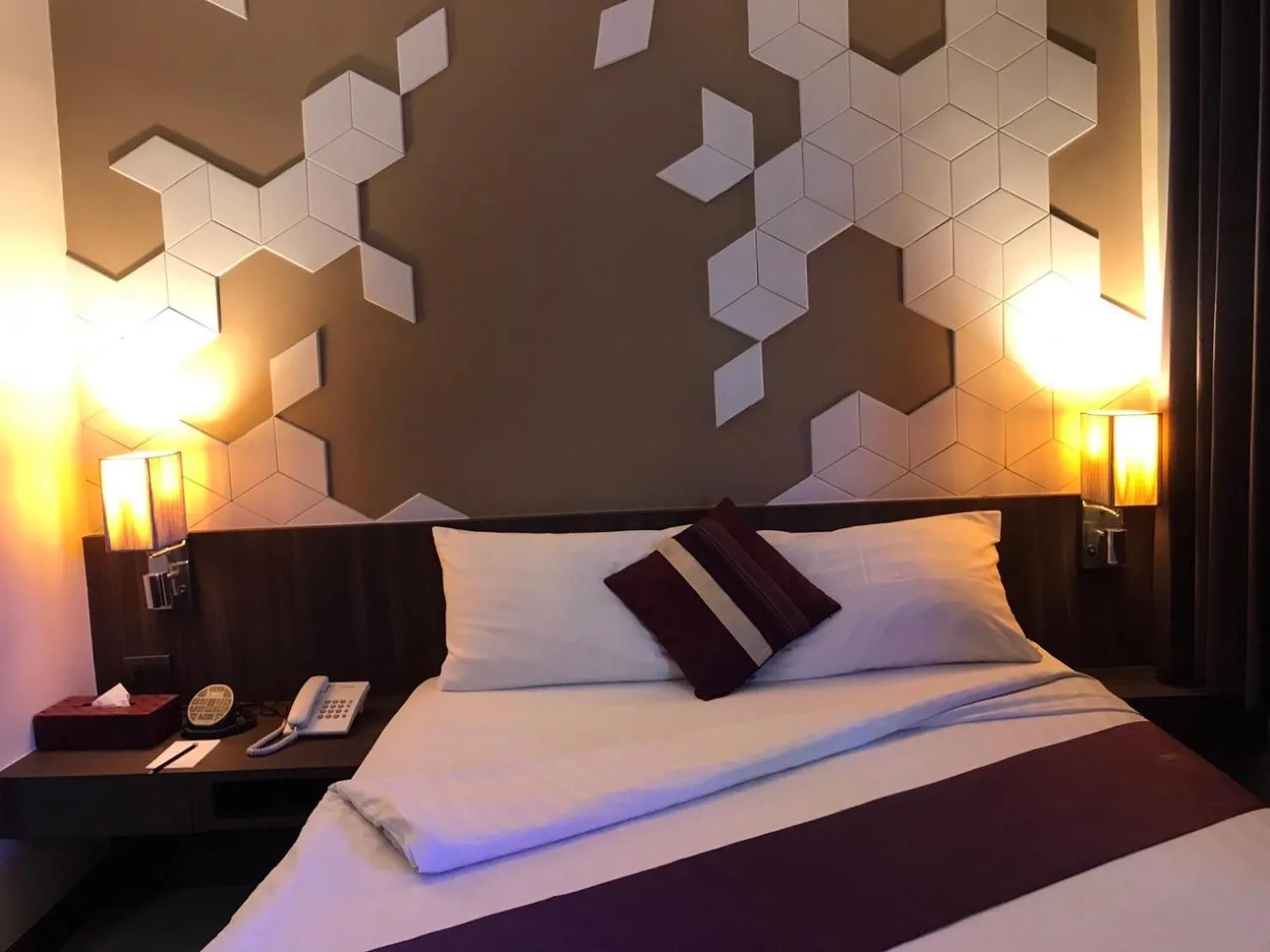 Bed in Paradiso Boutique Suites