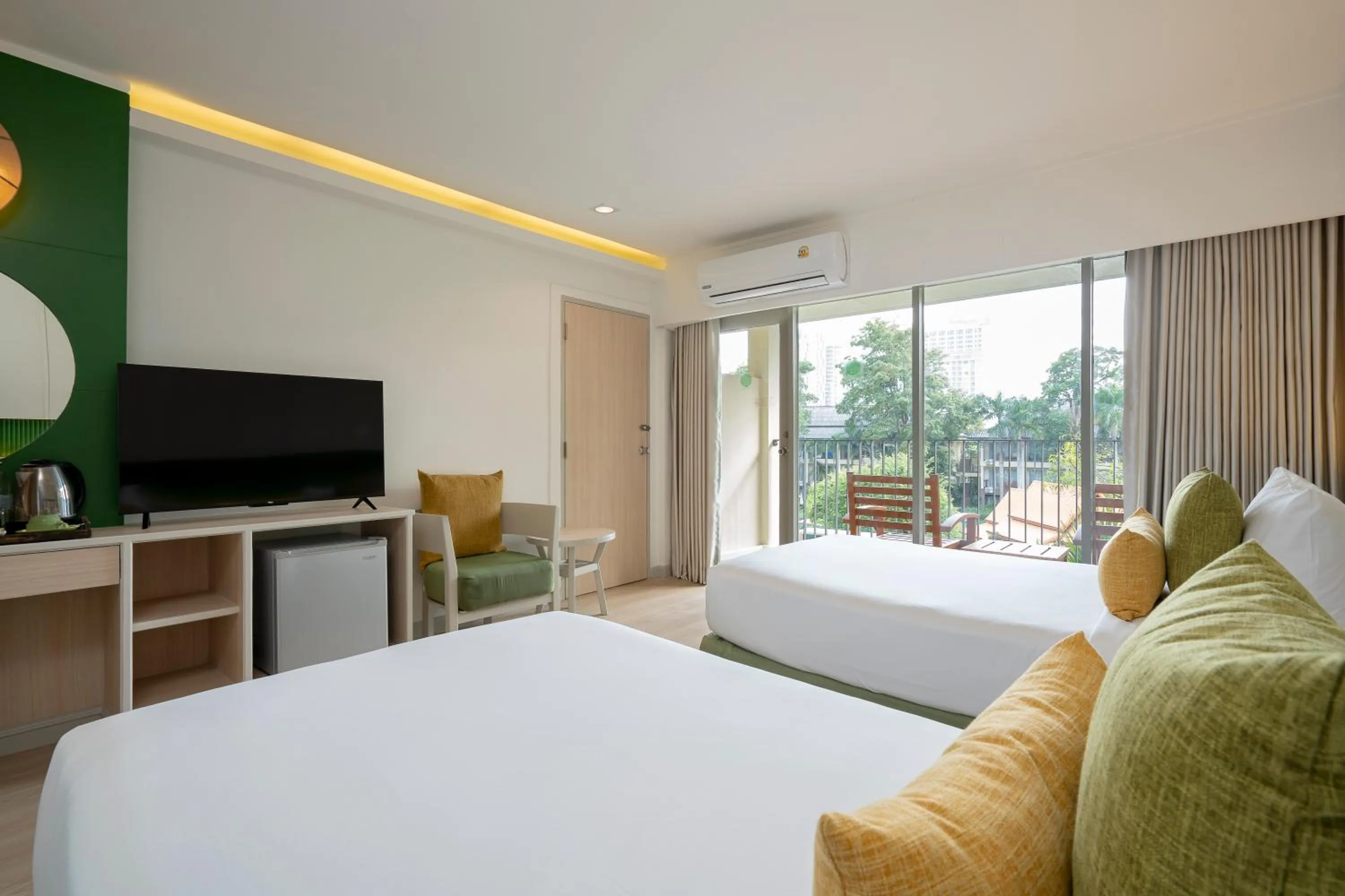 Bed in The Green Park Resort