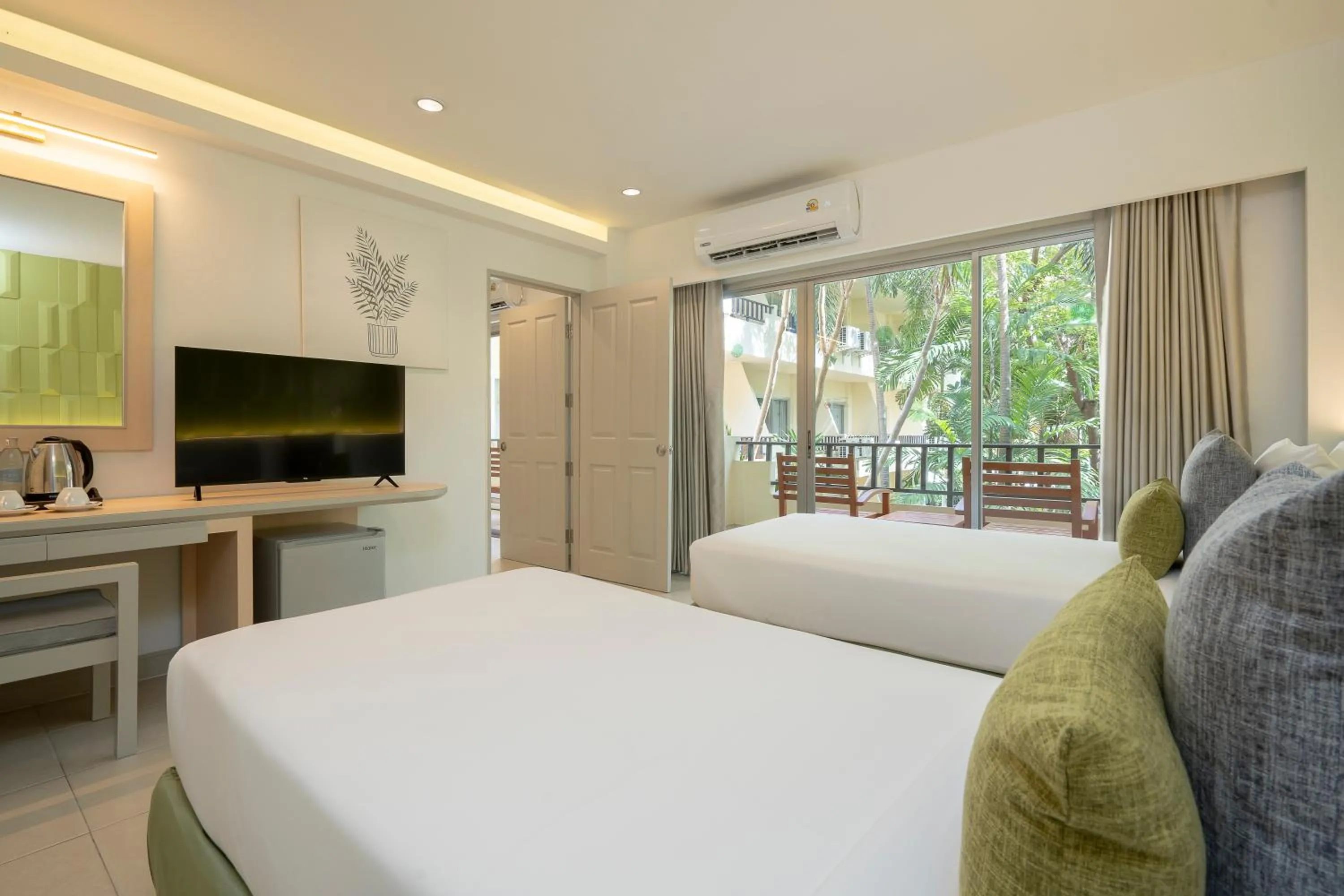 Bed in The Green Park Resort