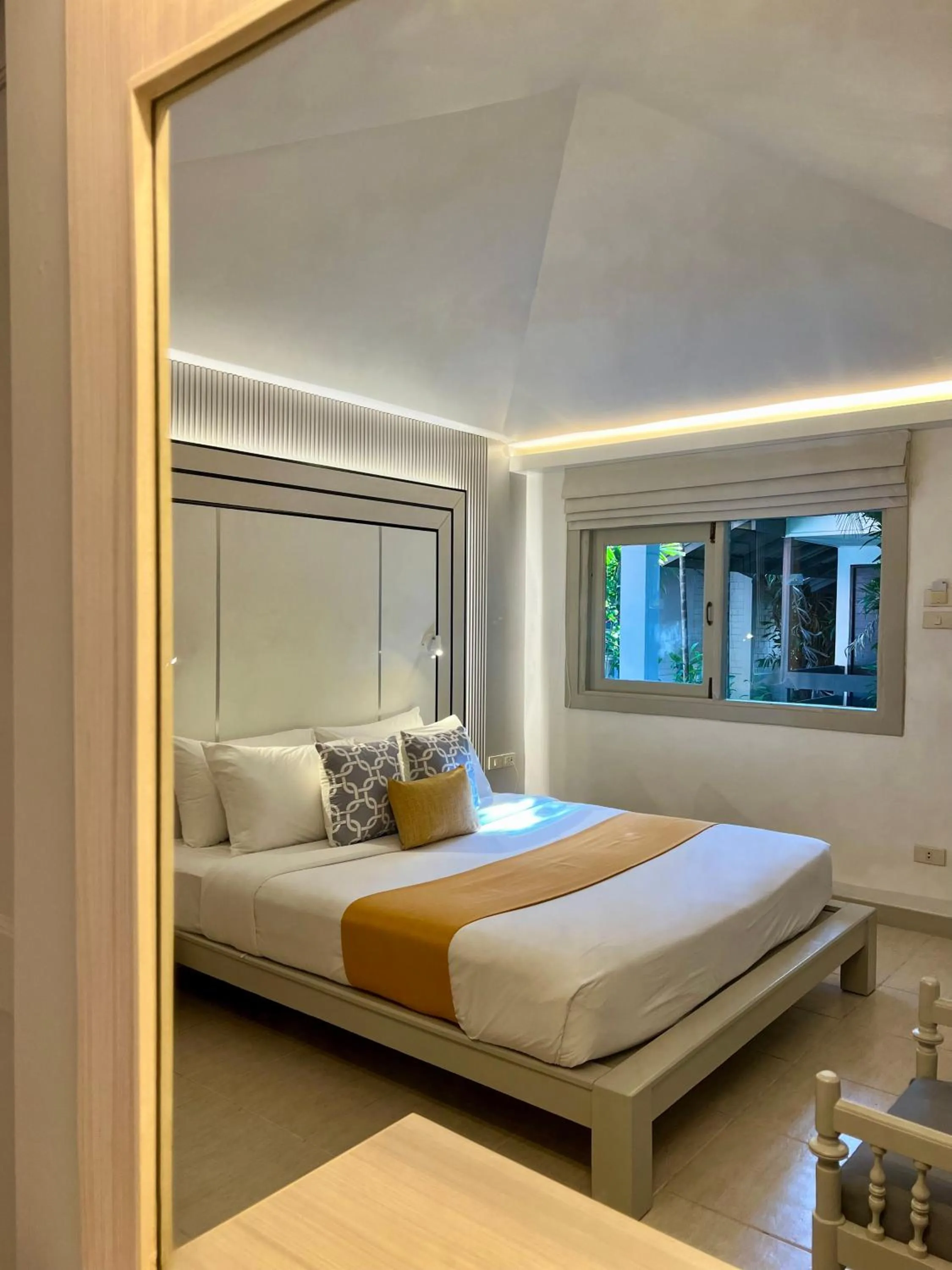 Bed in Sunshine Garden Resort