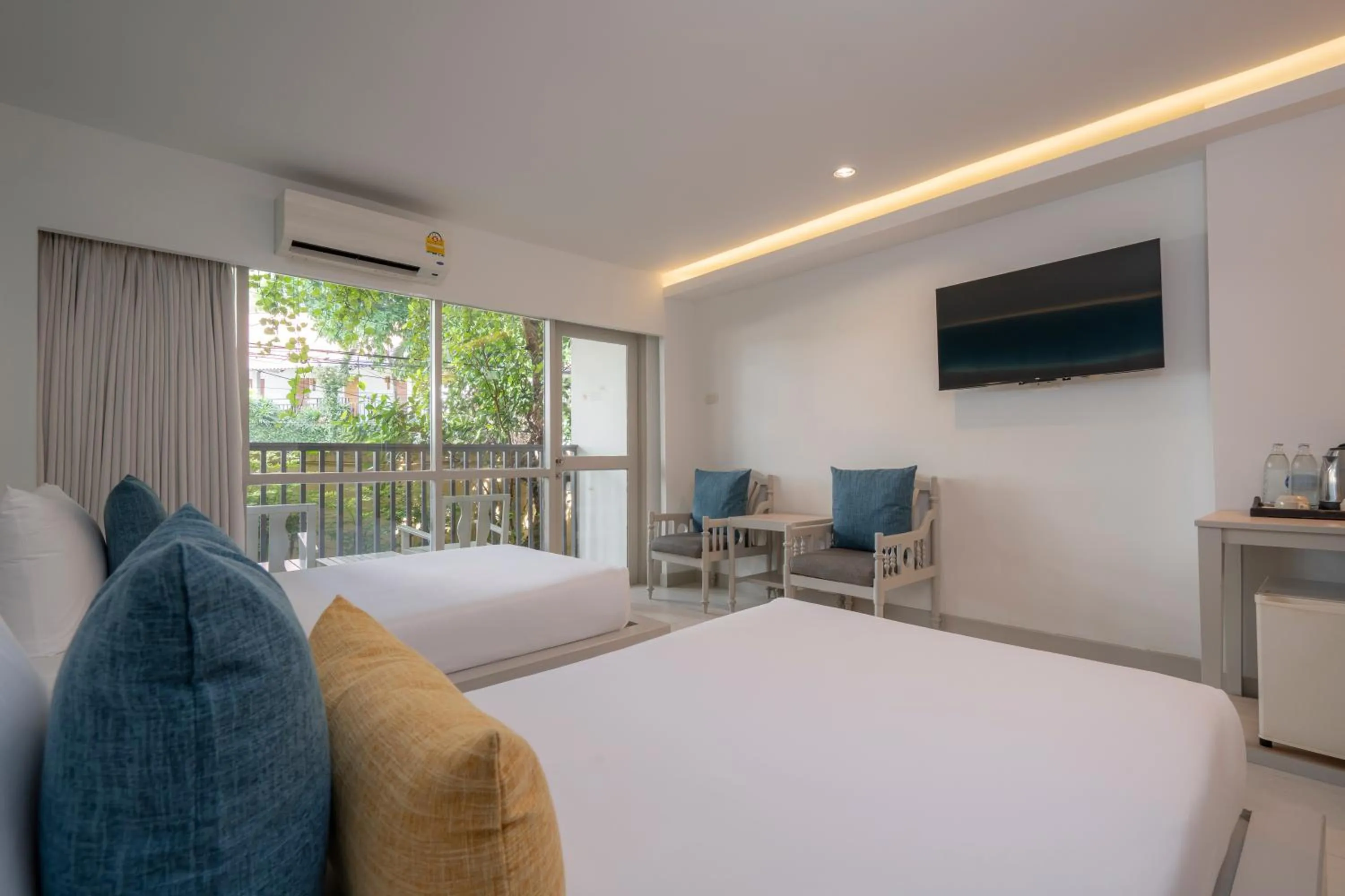 Bed in Sunshine Garden Resort