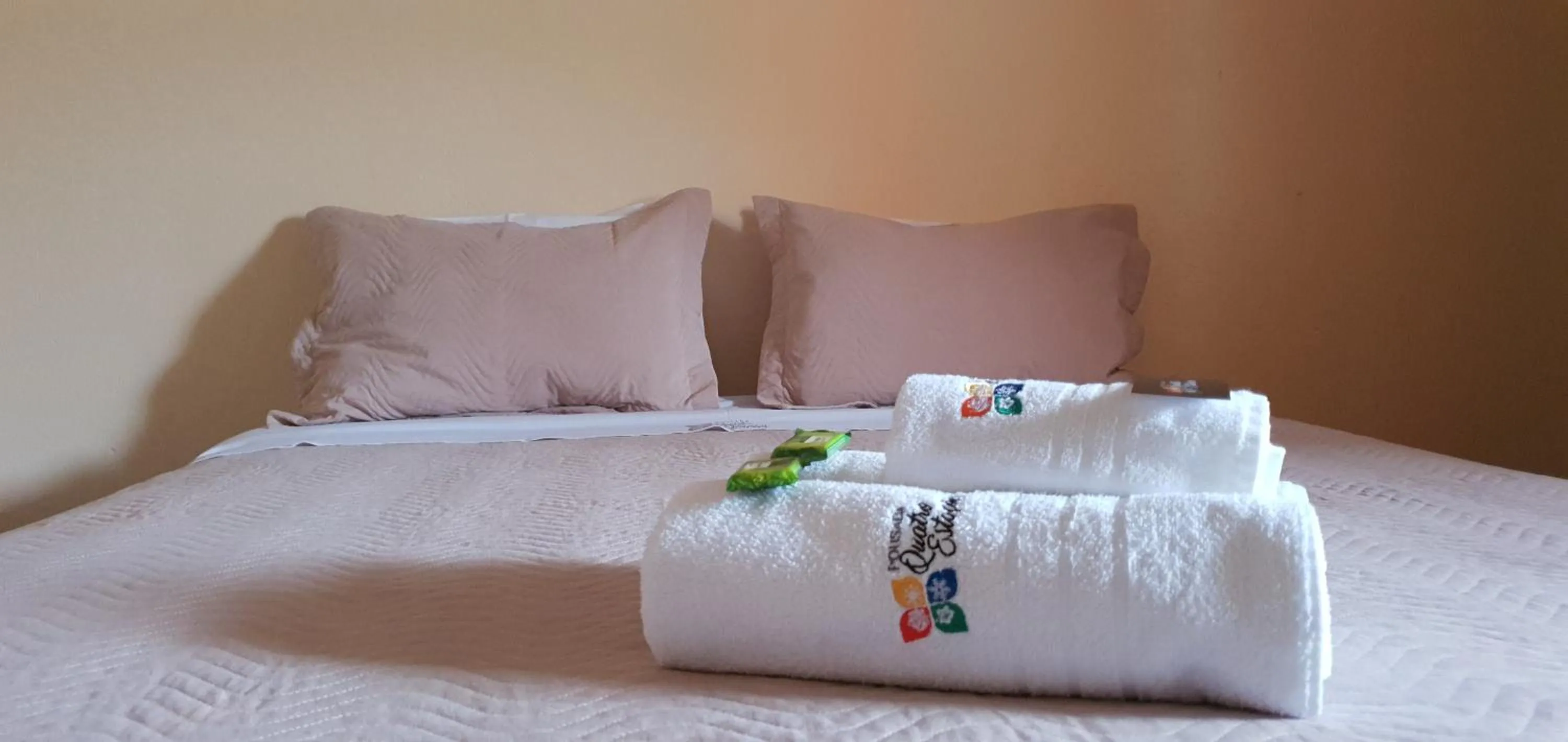 Bed in Pousada Quatro Estações