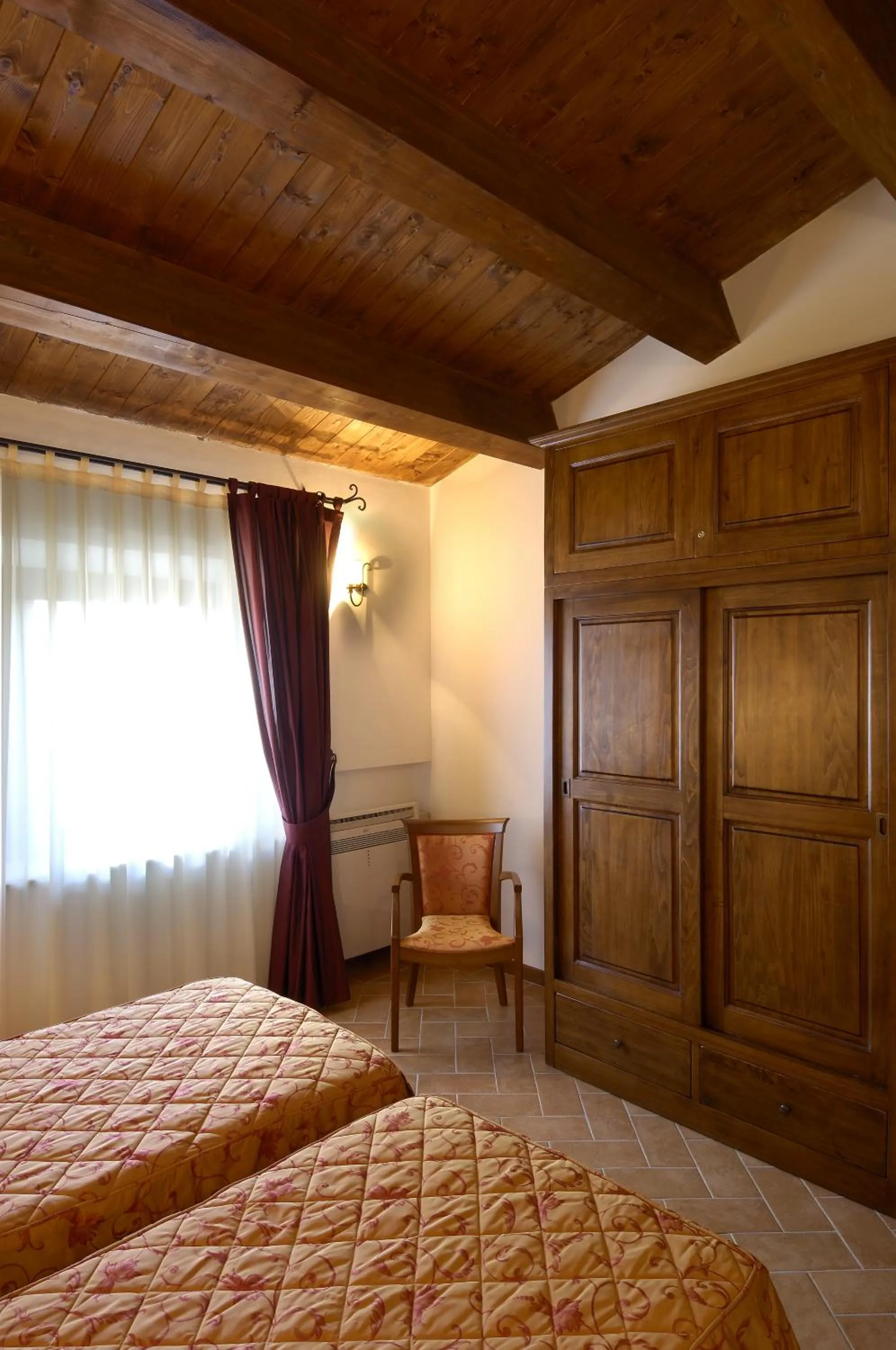 Bed in Colleverde Country House & SPA Urbino