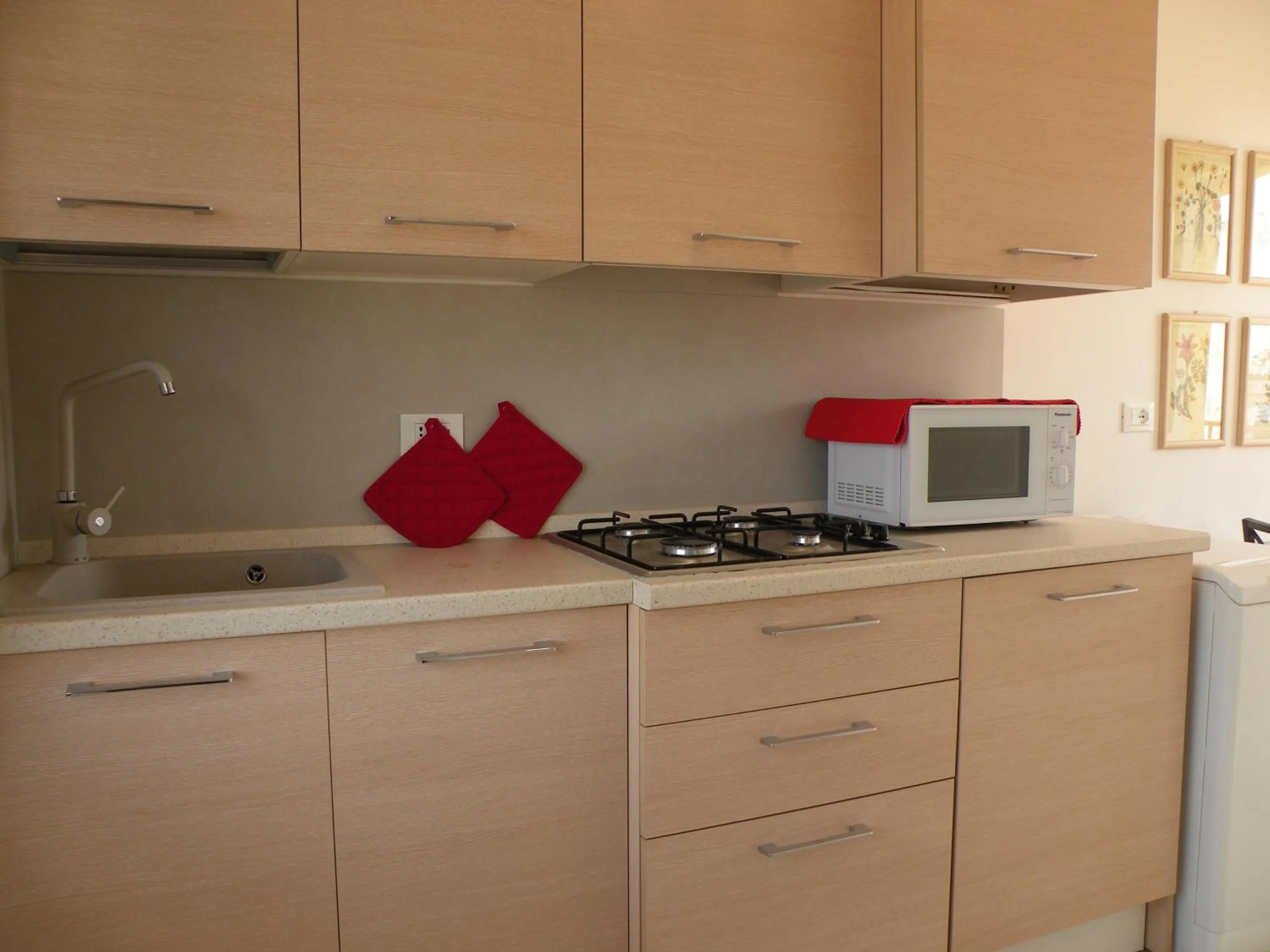 Kitchen or kitchenette in La Casa sul Corso B&B