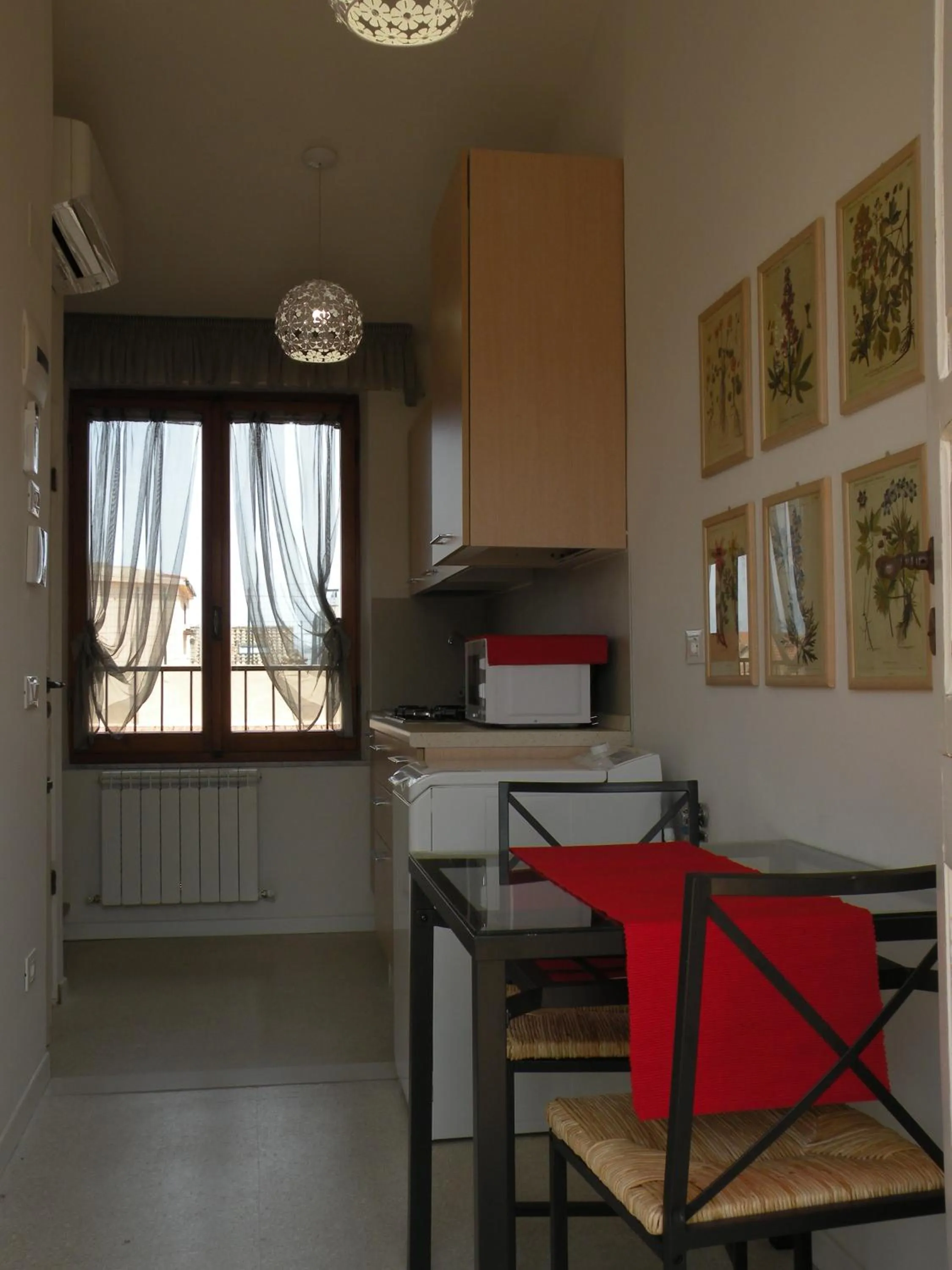 Kitchen or kitchenette in La Casa sul Corso B&B