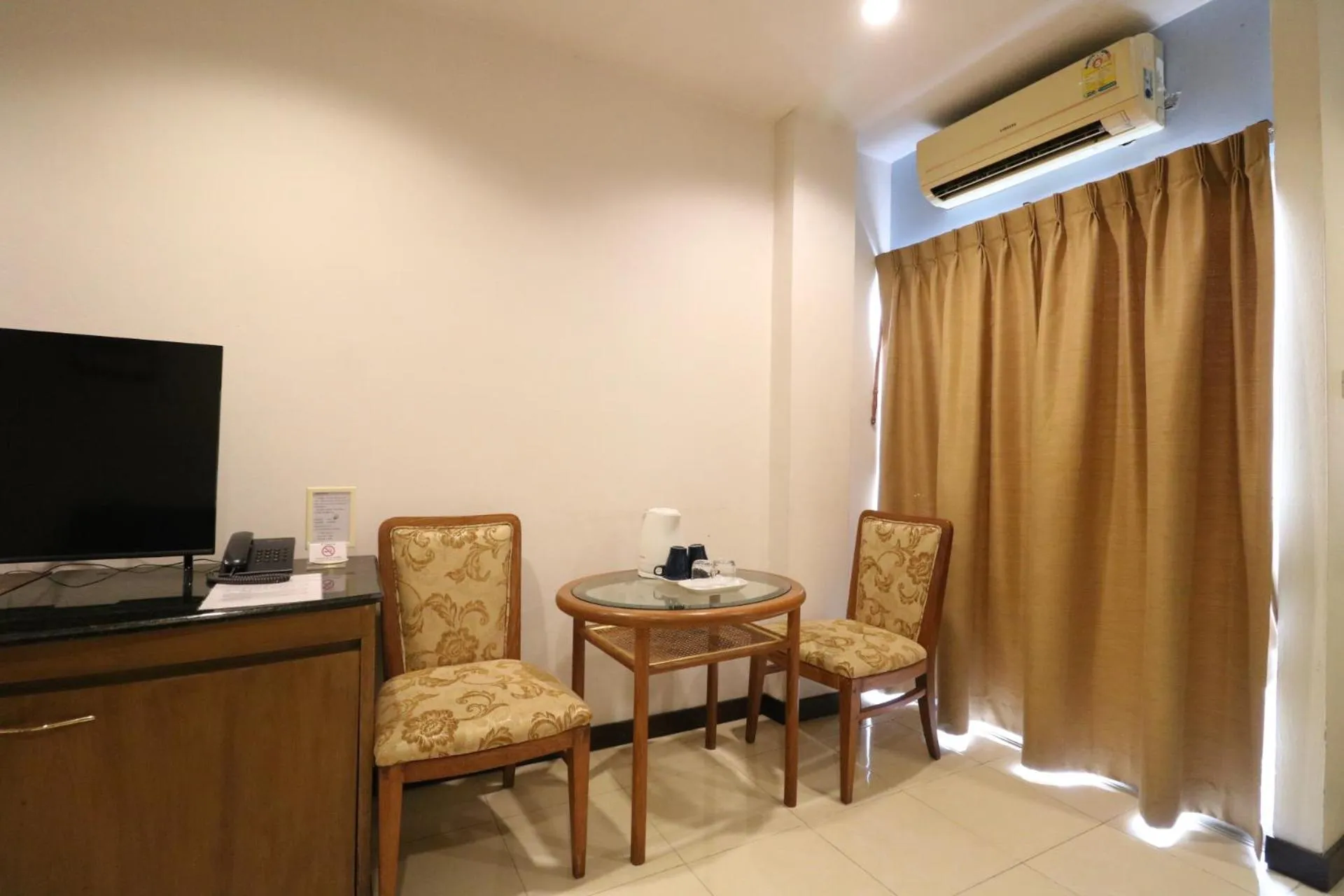 Seating area in JL Bangkok Hotel